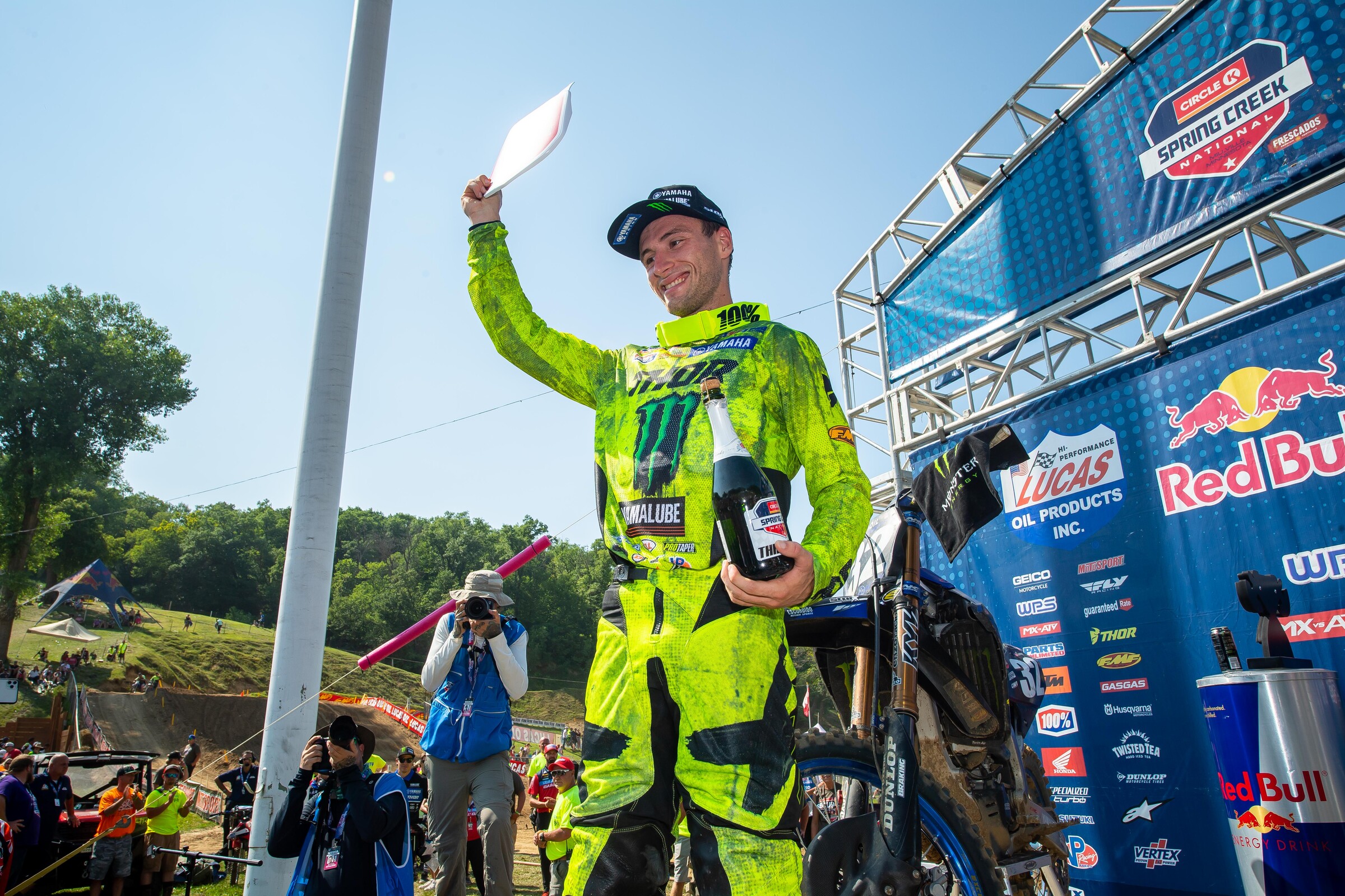 Justin Cooper with the red plate, signaling he is the points leader after round six.