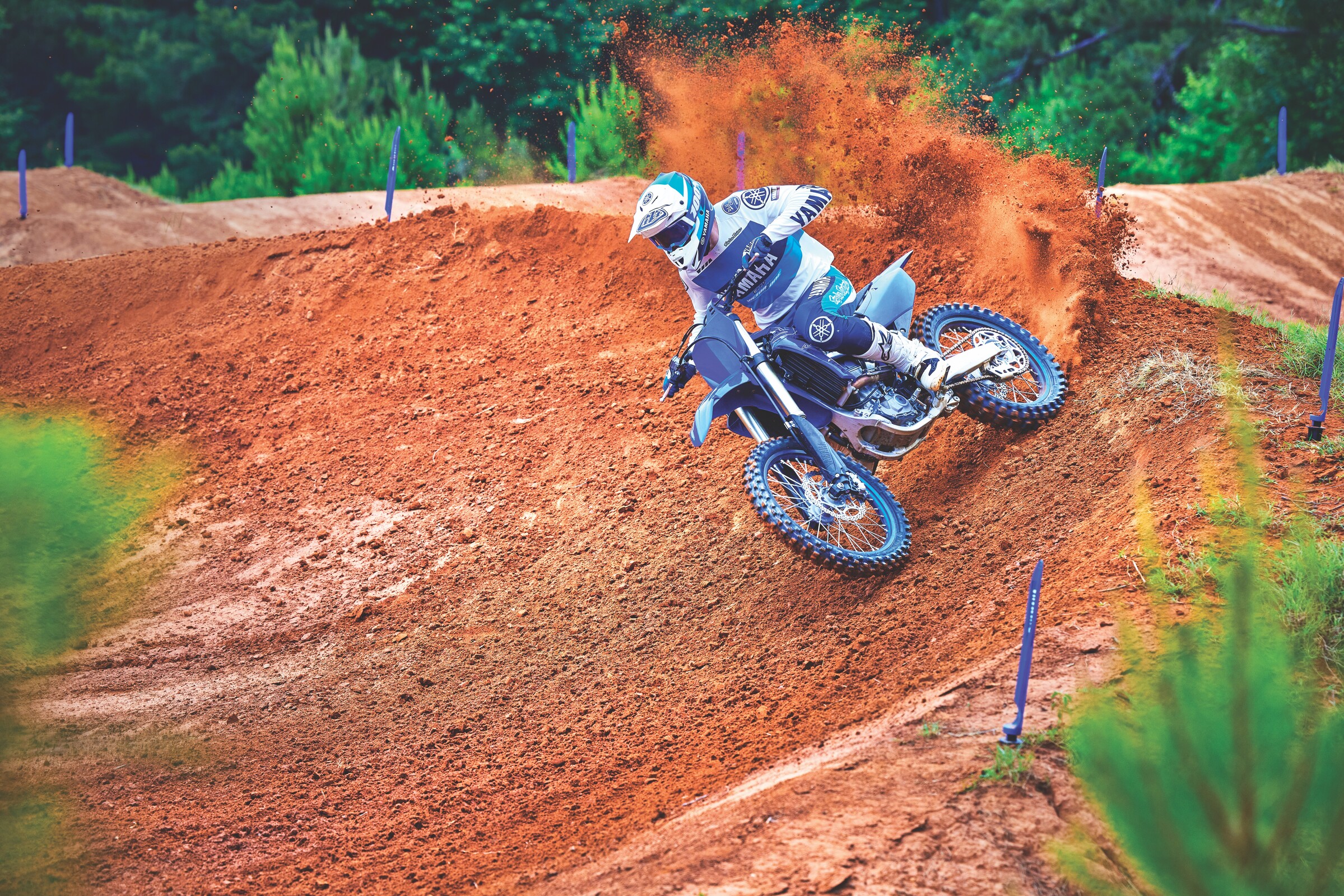 Professional rider with advanced skill depicted on a closed course.