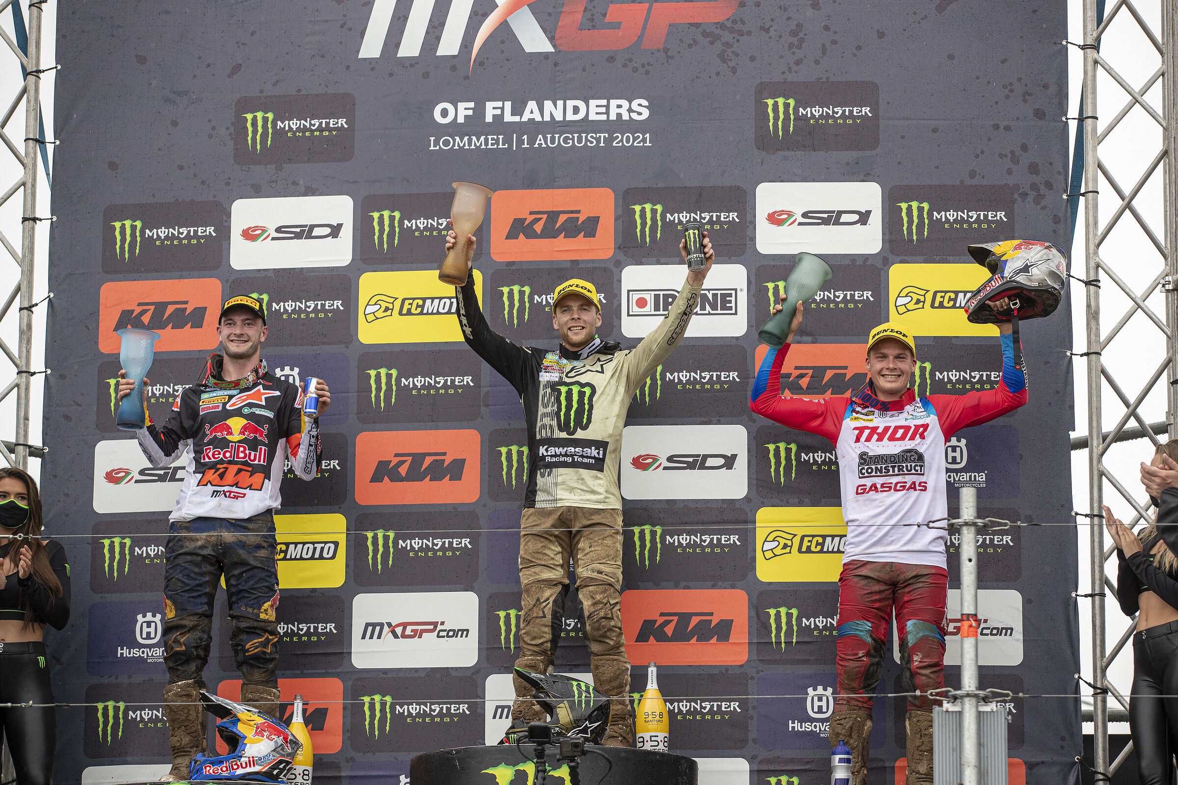 Romain Febvre (middle, first overall with 2-1), Jeffrey Herlings (left, second overall with 1-5 finishes), and Pauls Jonass (right, third overall with 4-2 finishes).