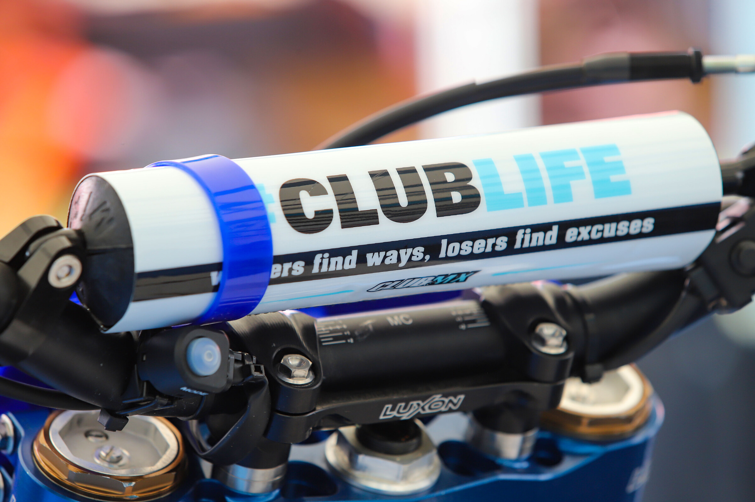 The ClubMX team's handlebar pad message: 