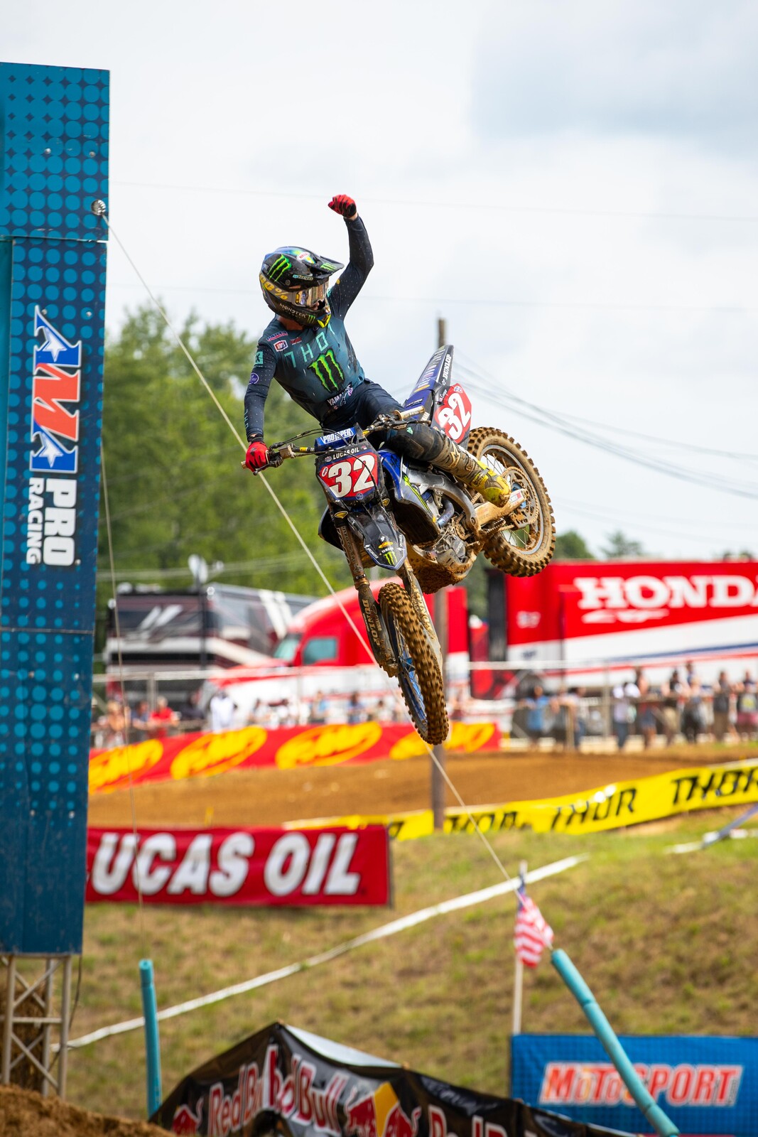 Cooper claimed the 250 Class moto win with a whip and fist pump.