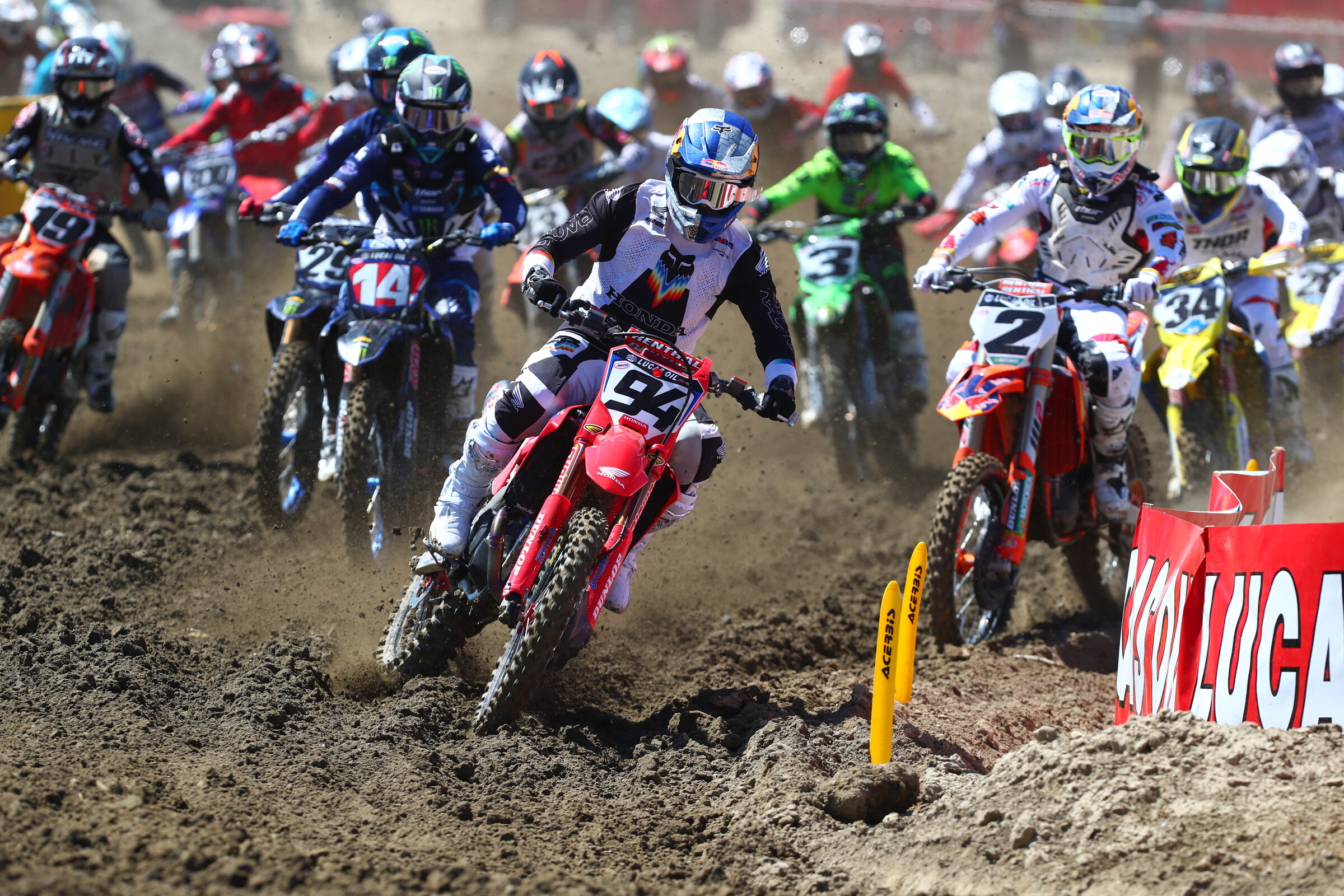 Ken Roczen leads them into turn two.