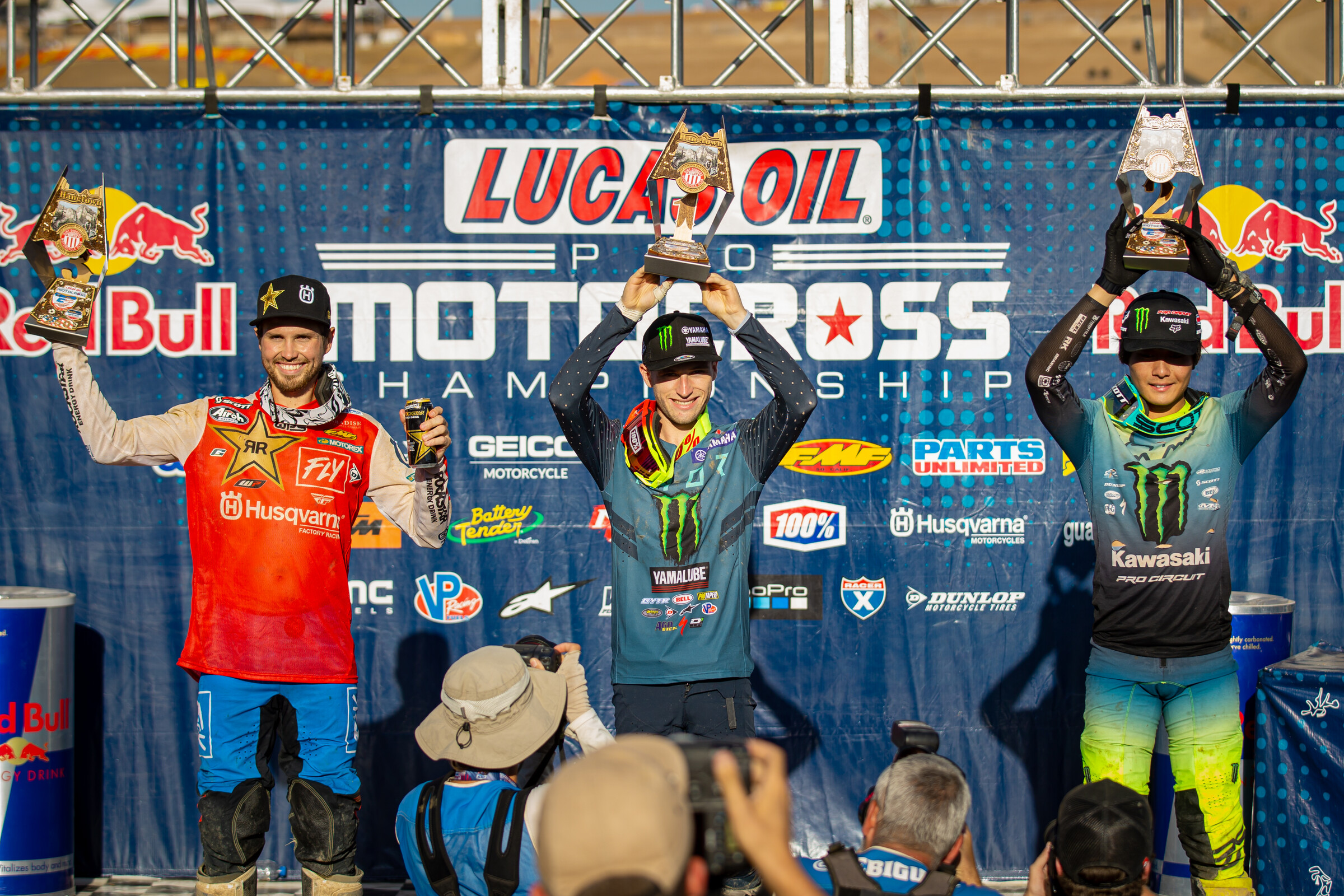 The 2021 Hangtown Motocross Classic 250 Class overall podium: Justin Cooper (middle, 1-1 for first overall), Jo Shimoda (right, 4-2 for second overall), and RJ Hampshire (left, 2-6 for third overall).