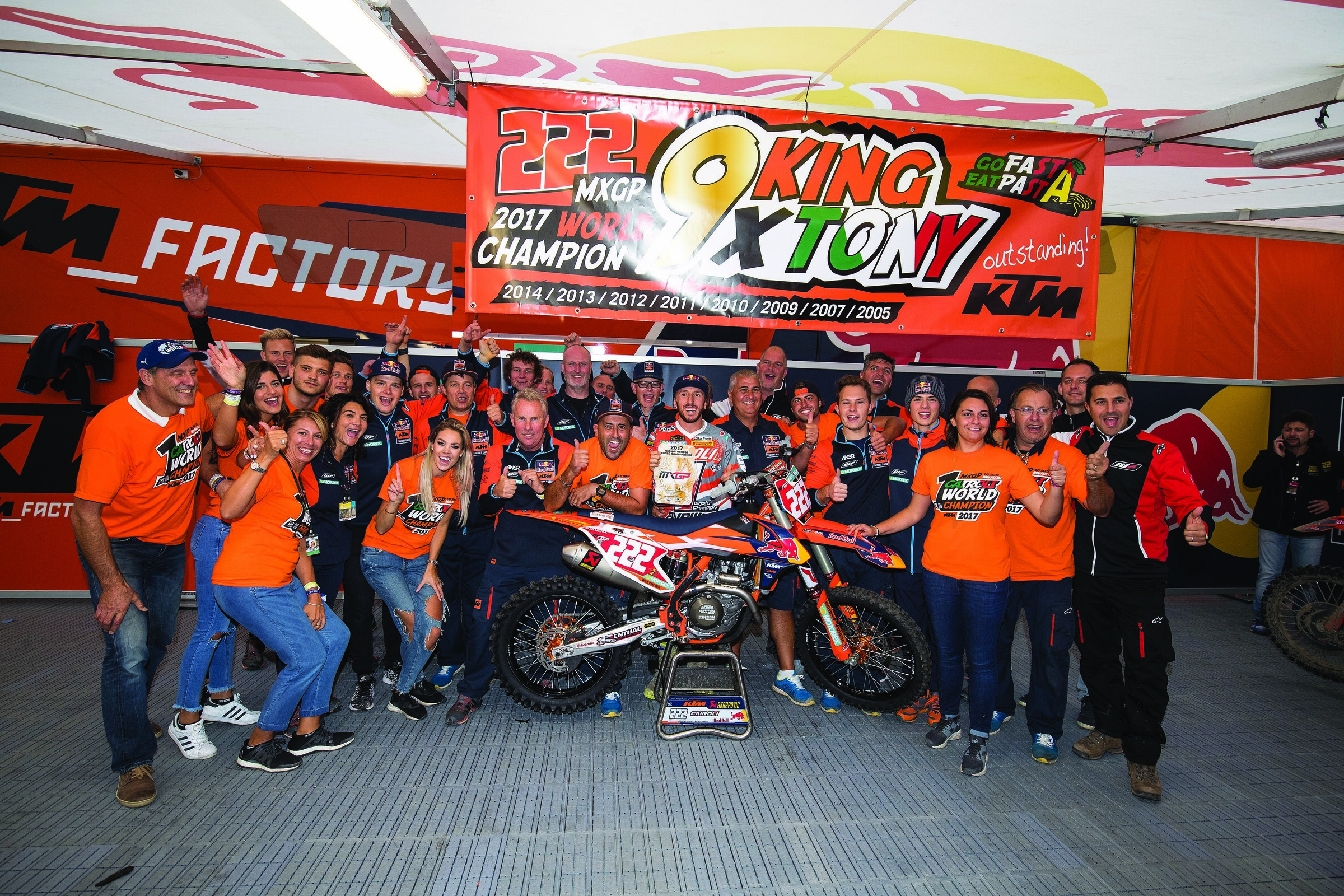 Cairoli celebrates with the Red Bull KTM team after clinching his ninth World Title in 2017.