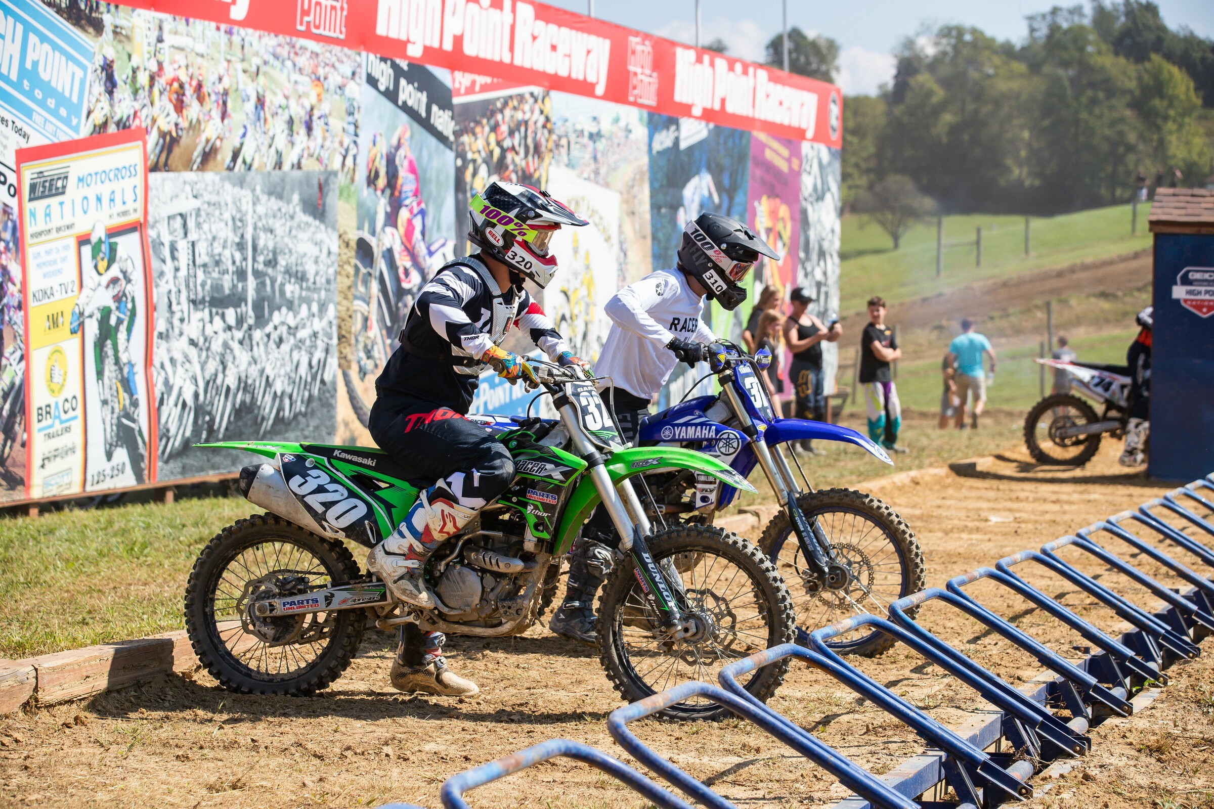 Derek Garcia (#320) and Mitch Kendra (#310) at the start of their moto on Sunday.