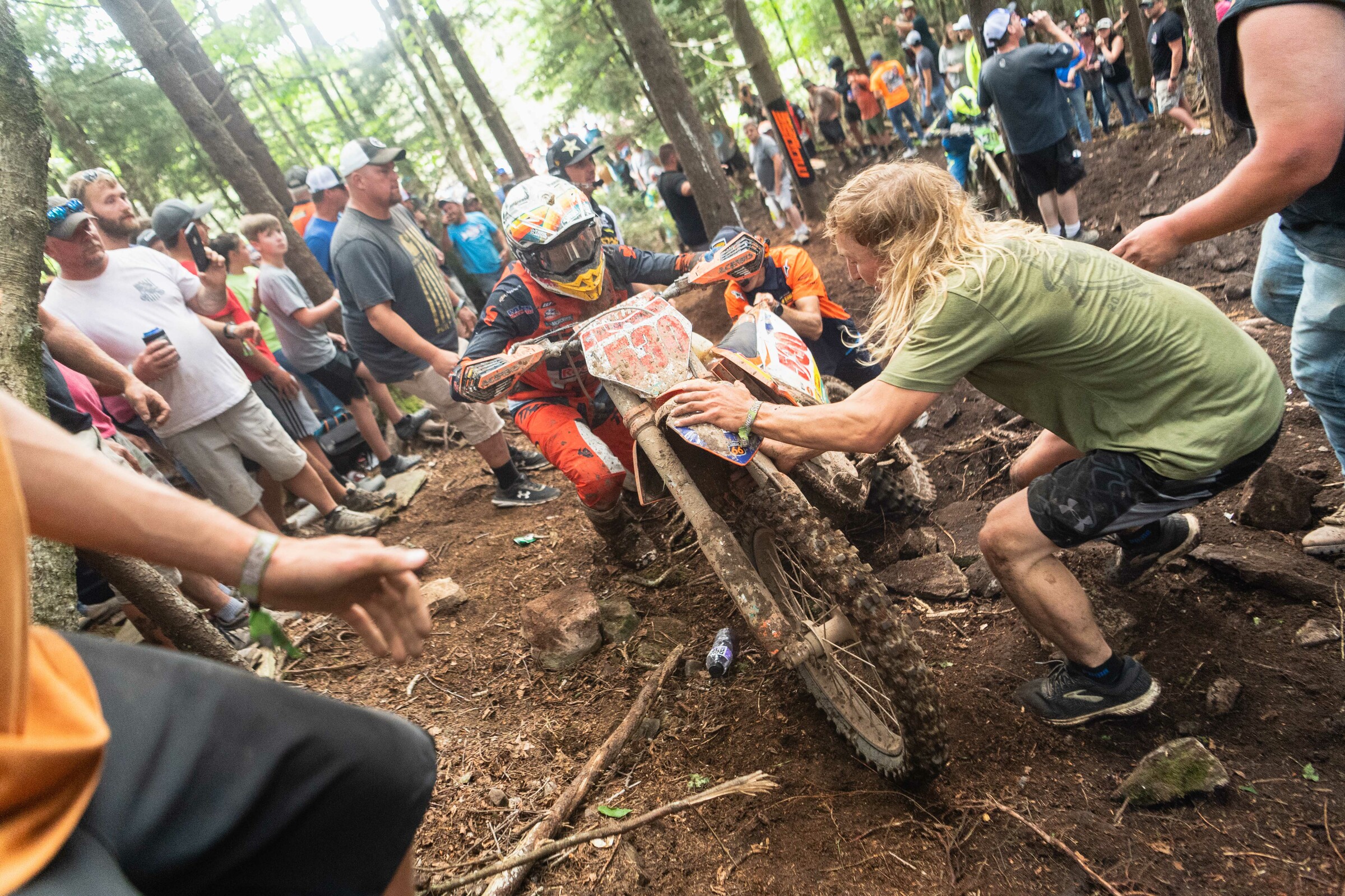 Kelley gets some help from fans and team members.