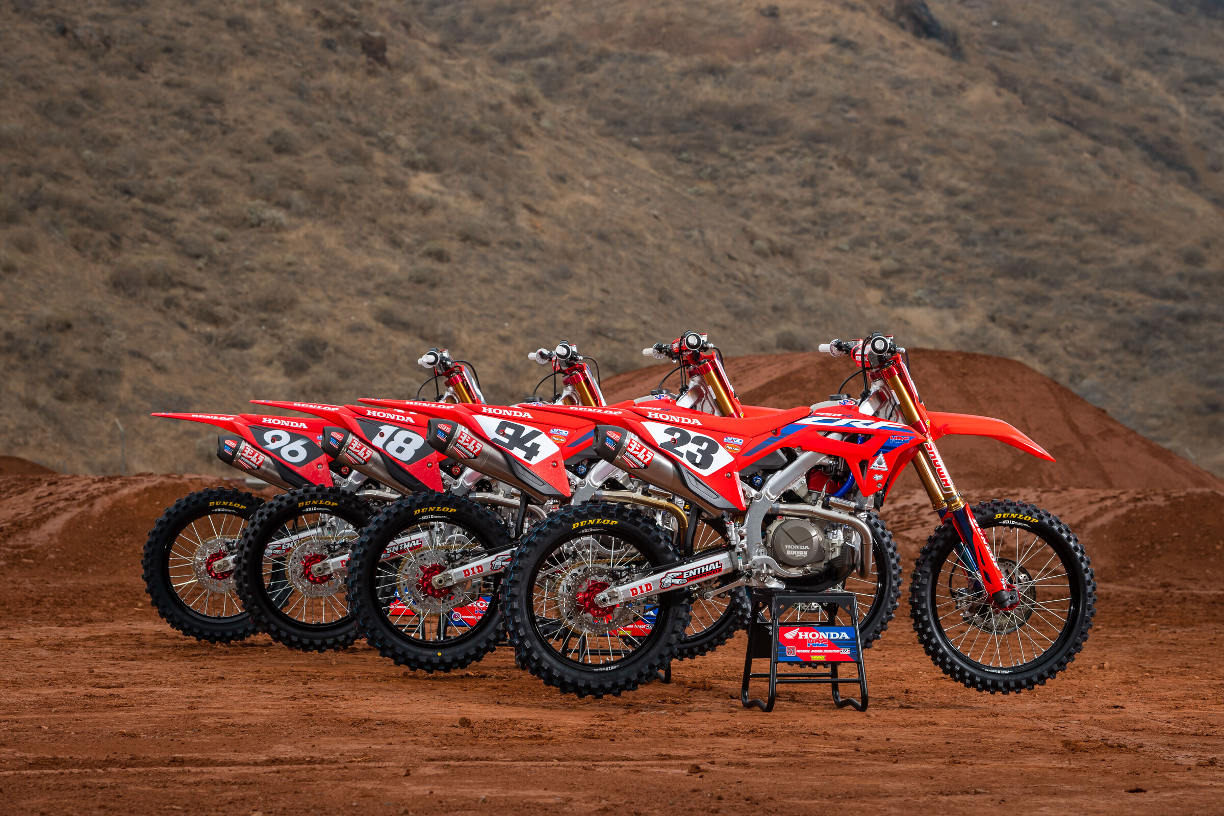The 2022 Honda HRC race machines: #23 Chase Sexton and #94 Ken Roczen in the 450 Class and #18 Jett Lawrence and #96 Hunter Lawrence in the 250 Class.