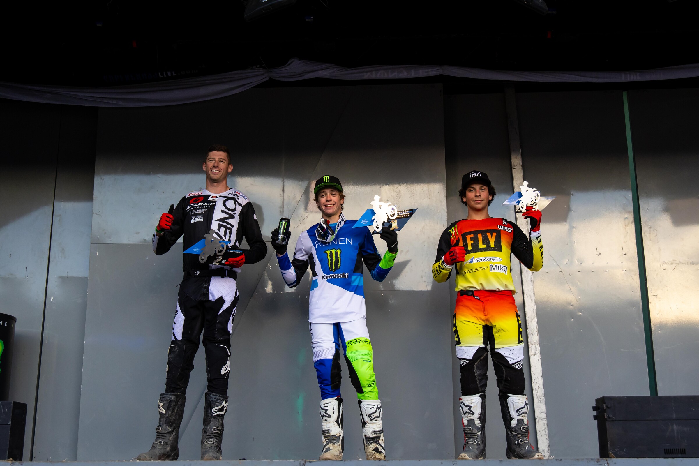 Ryder DiFrancesco (middle, Kawasaki), Nicholas Nisbet (left, Honda), and Dylan Cunha (right, Kawasaki) were the three podium finishers in the Oakland Supercross 250SX Futures main event.