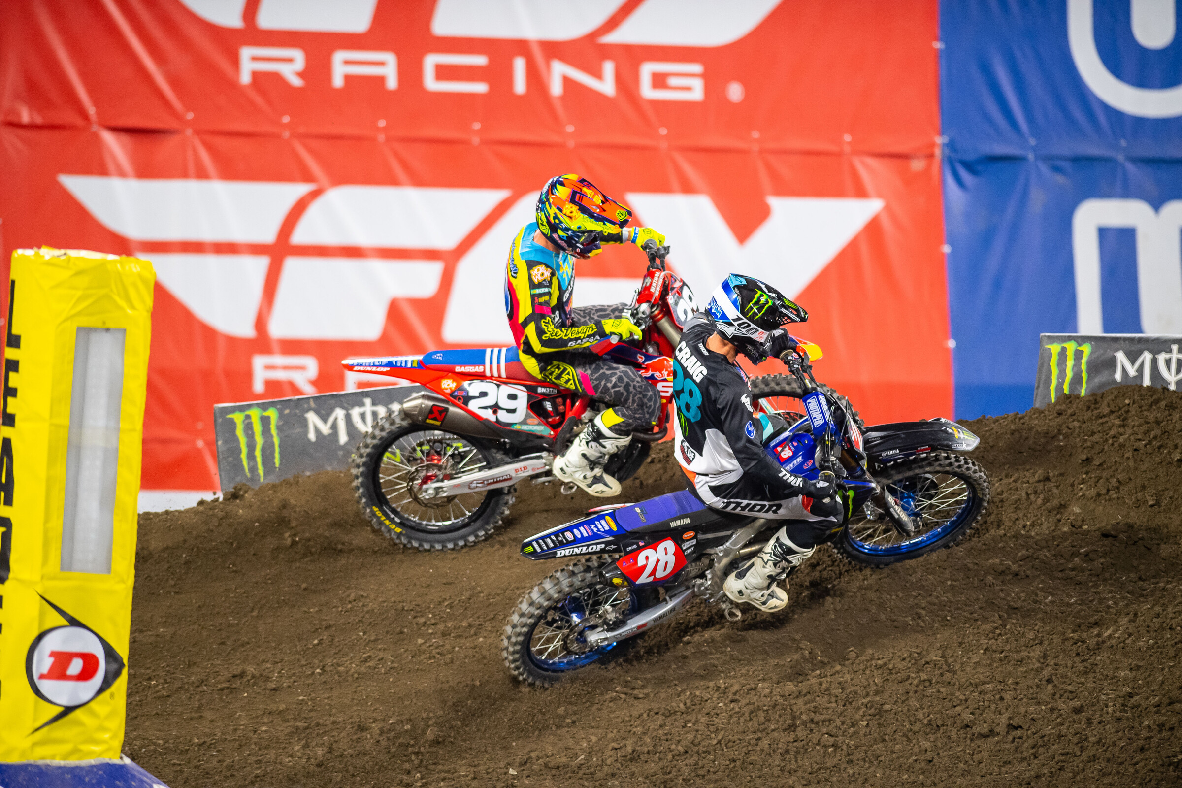 Christian Craig passing Michael Mosiman to take the lead in the 250SX main event.