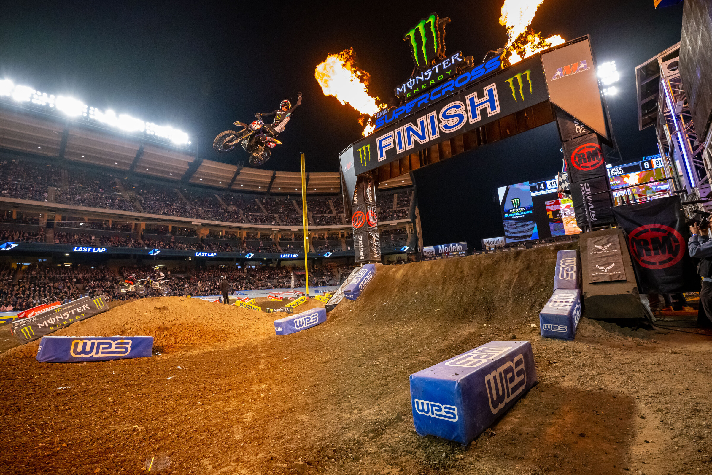 Craig taking the checkered flag in the Anaheim 2 Supercross 250SX main event.