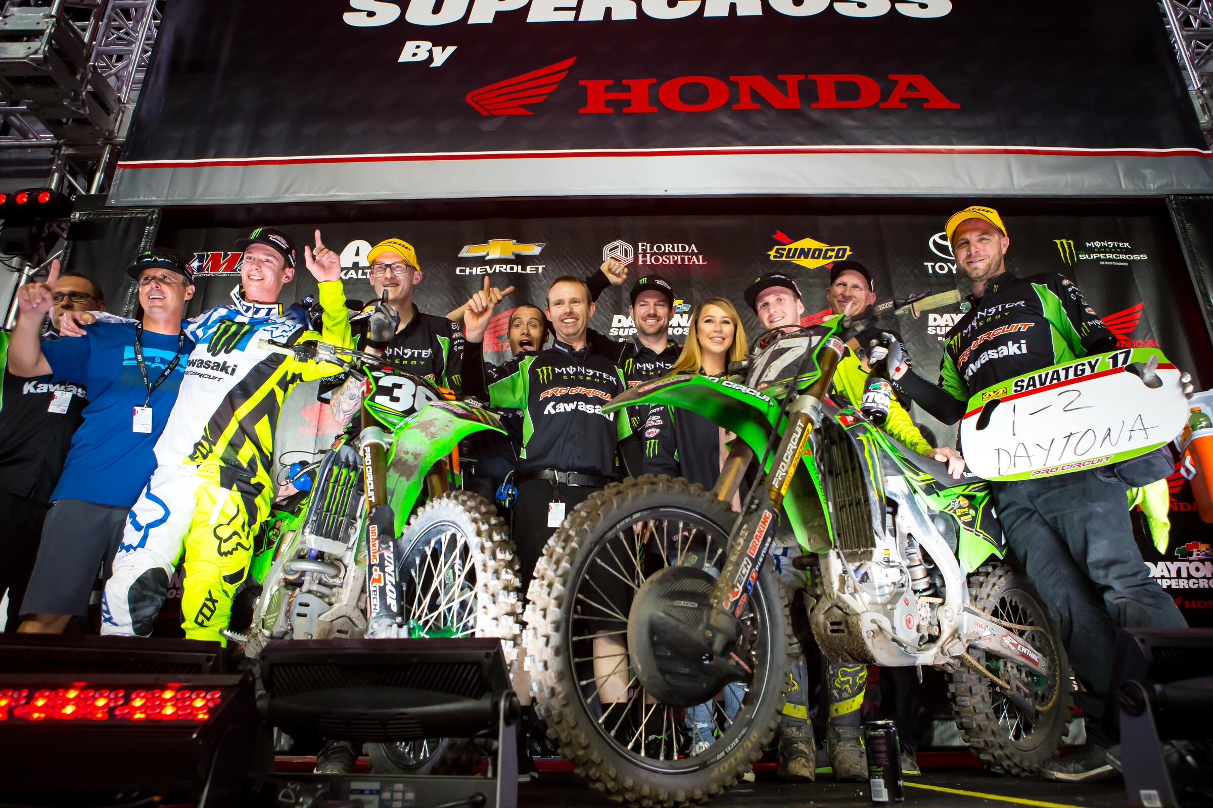 Adam Cianciarulo celebrating his Daytona victory with Joey Savatgy and his Monster Energy/Pro Circuit Kawasaki team.