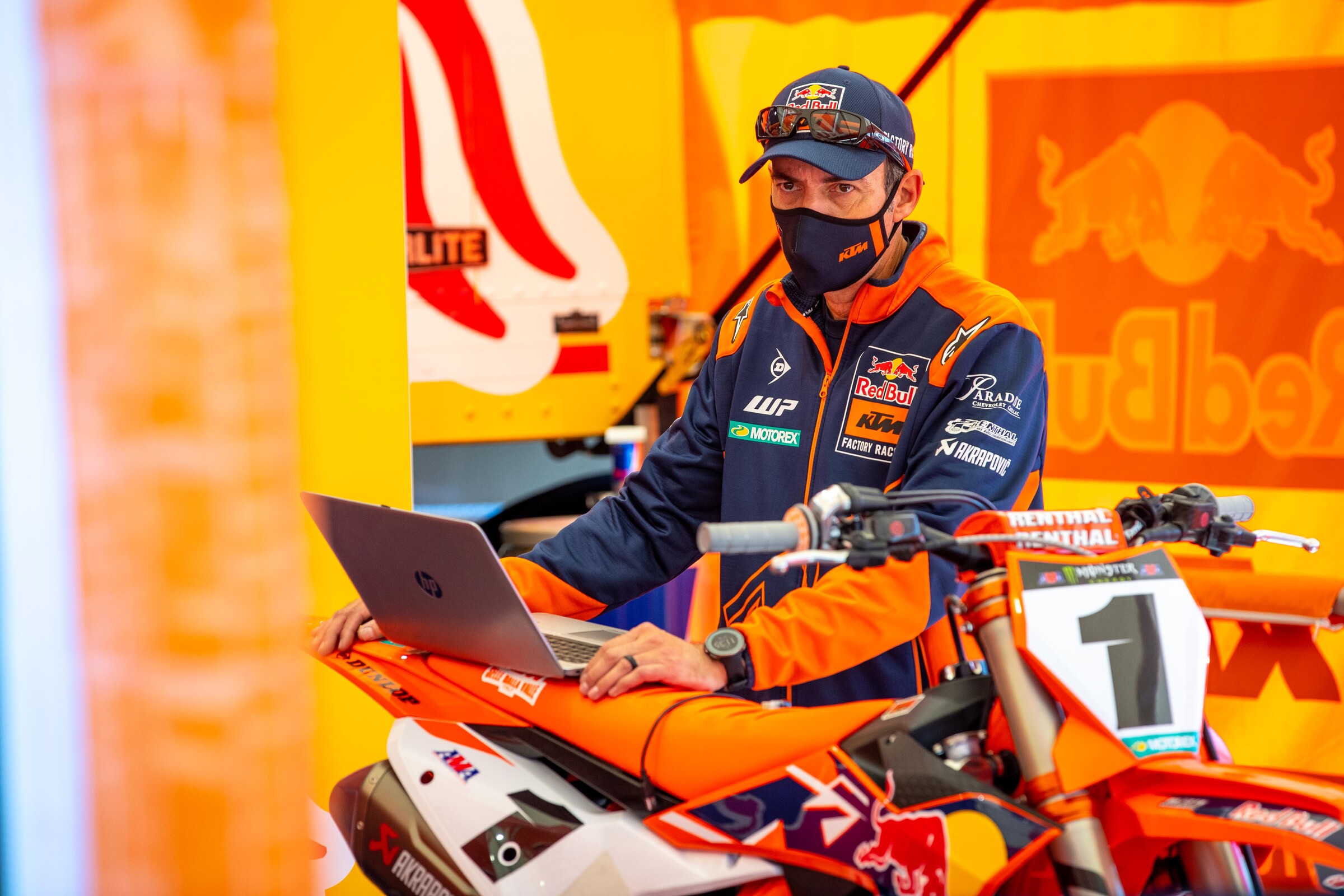 Webb's mechanic Carlos Rivera downloads stats from the race machine.