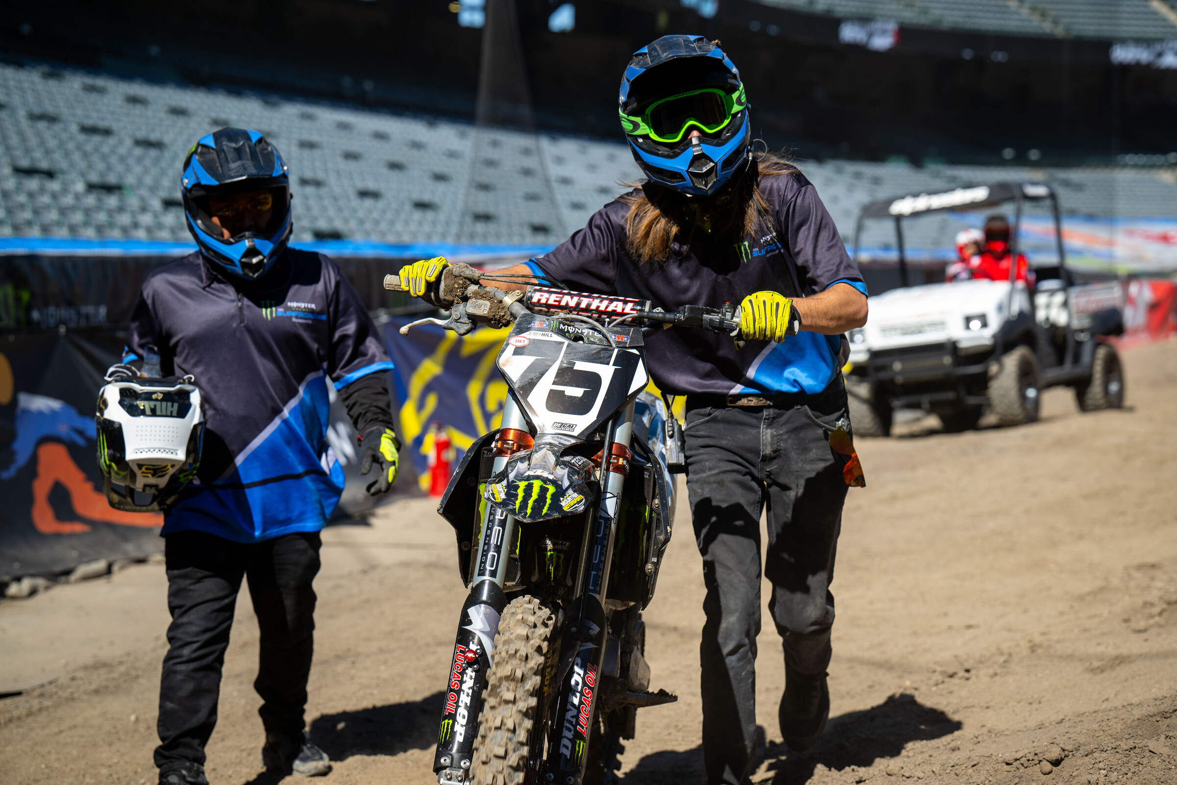 Track crew remove Hill's KTM 450 SX-F following a crash by the Oregon native during free practice.