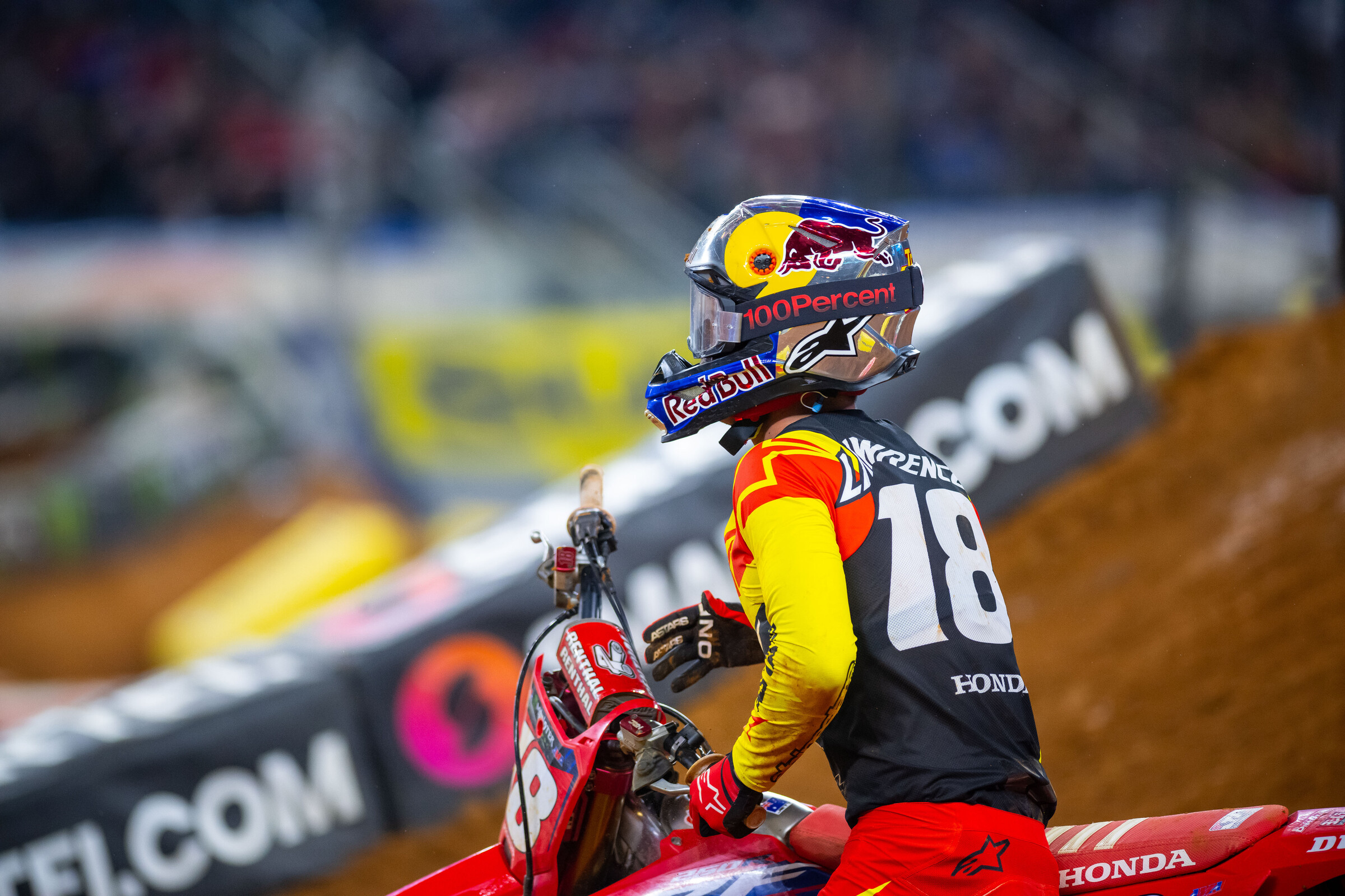 Lawrence picks up his bike.