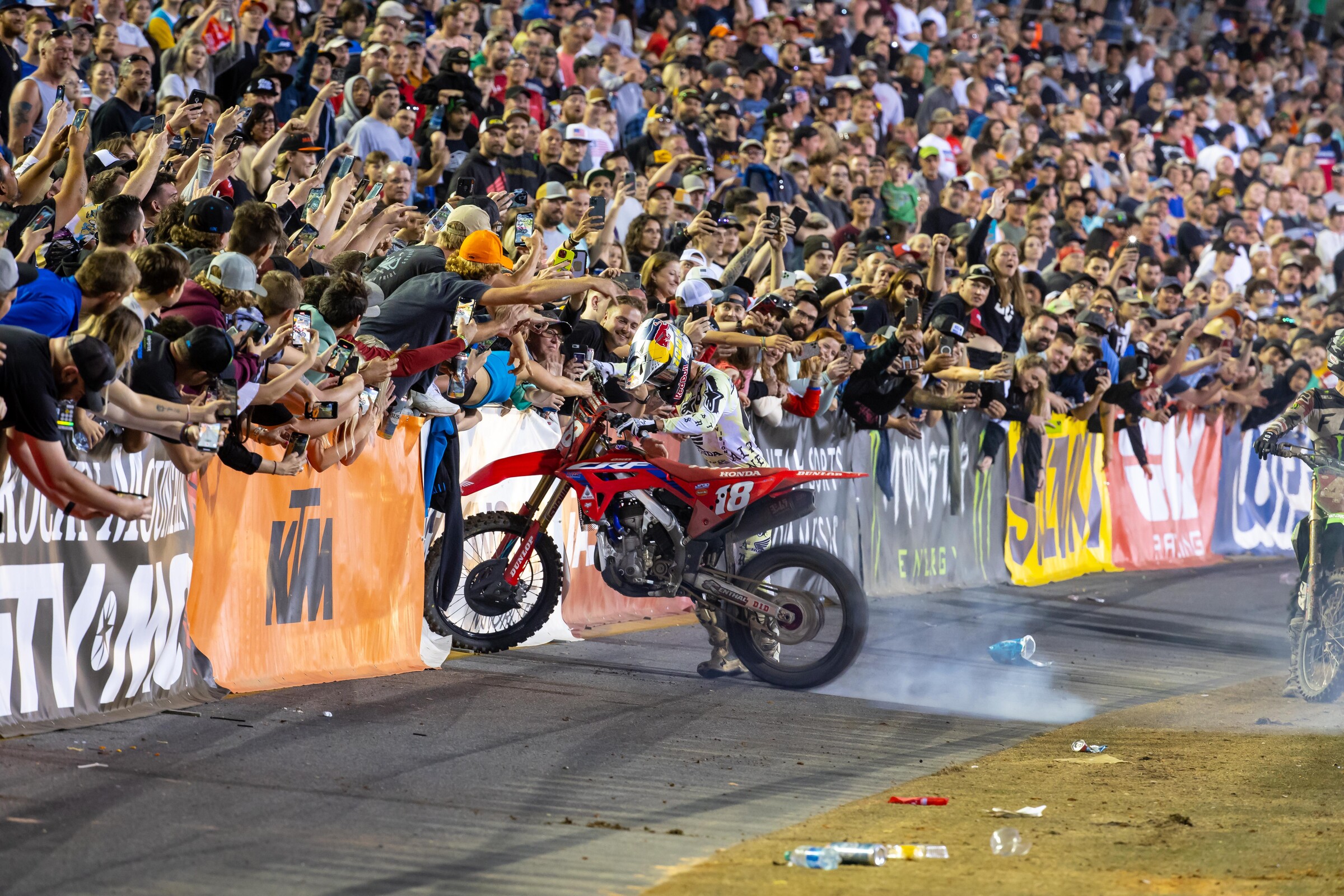 One of the young Australian's several burnouts after his win.