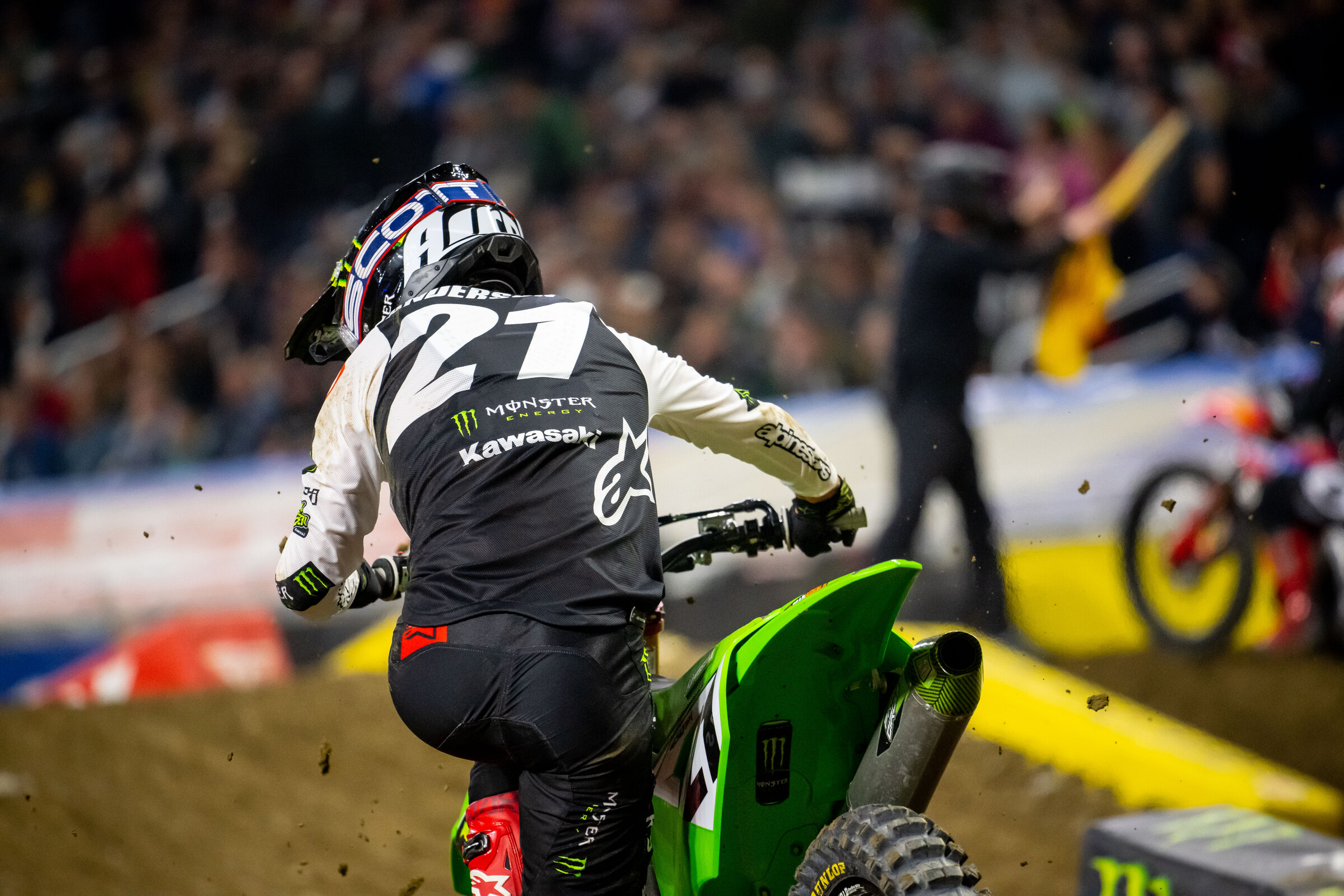 Anderson remounting after a crash in the turn following the finish line. He would suffer another crash moments later and his night would be over early.