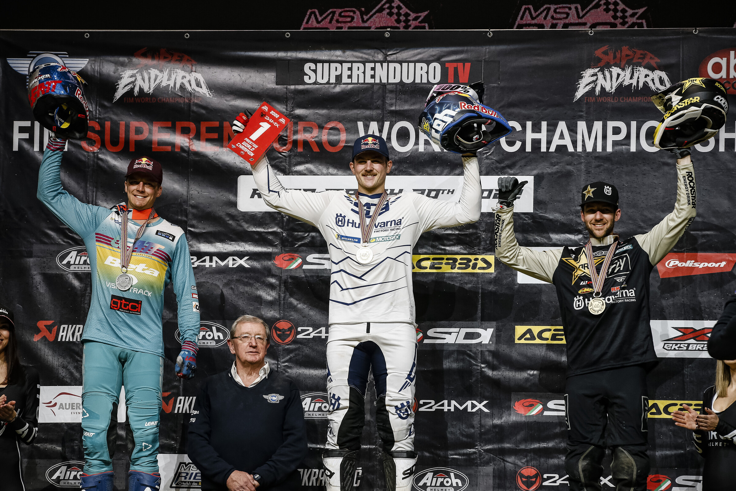 The 2022 championship top three: Billy Bolt (center, first on Husqvarna), Jonny Walker (left, second on Beta), and Colton Haaker (right, third on Husqvarna).