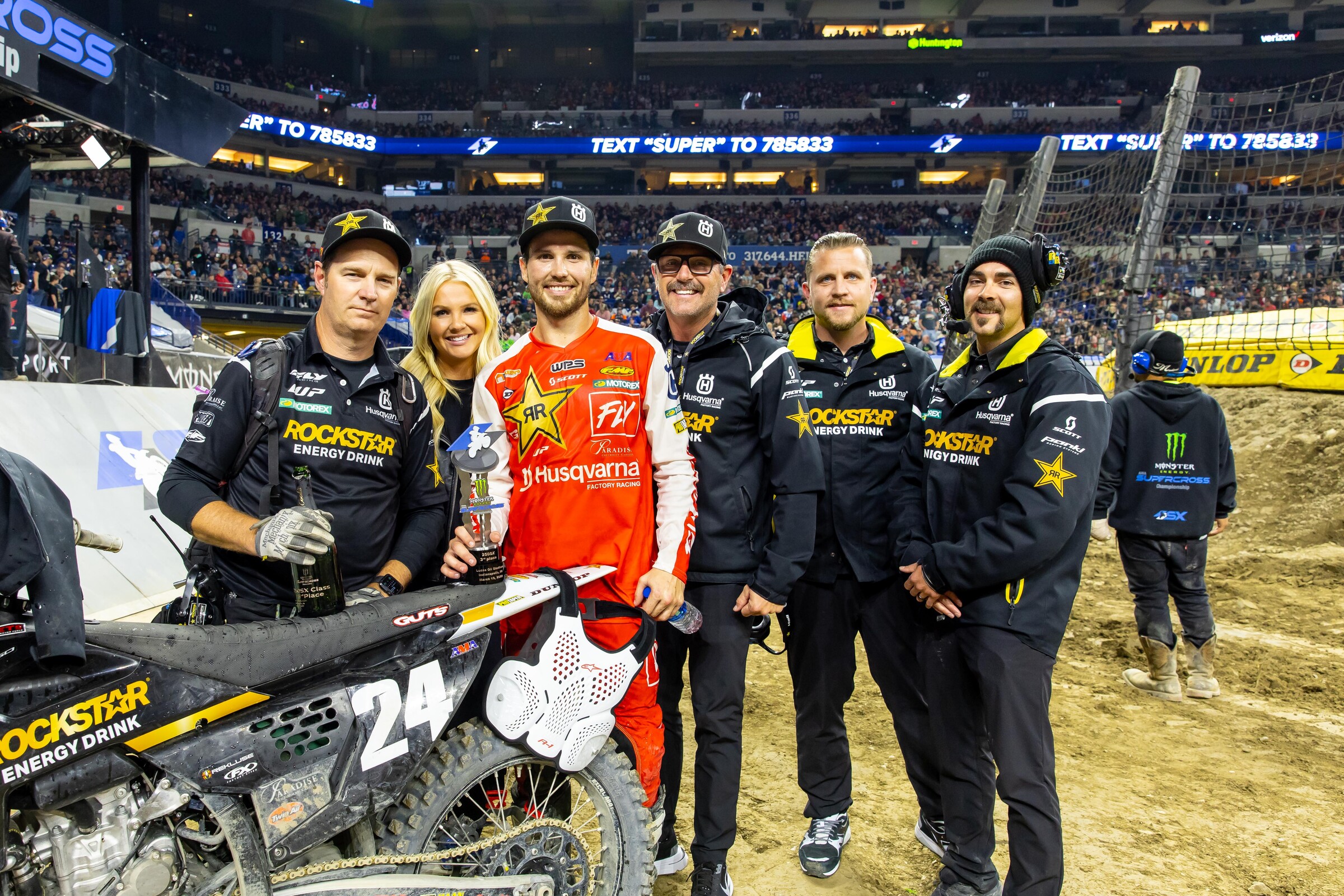 RJ Hampshire and the Rockstar Energy Husqvarna crew following his podium finish at the Indianapolis Supercross.