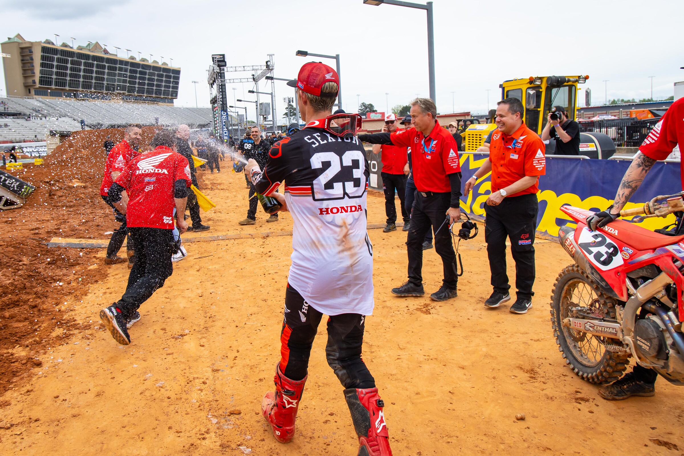 Sexton celebrating with the Honda HRC team after his podium finish.