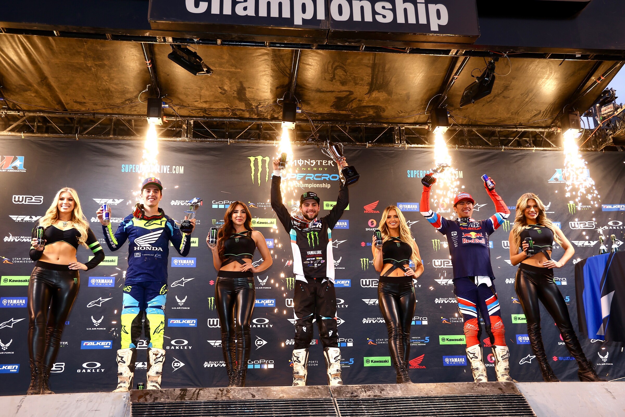 The Dave Coombs Sr. 250SX East/West Showdown main event podium: Nate Thrasher (center, first), Hunter Lawrence (left, second), and Pierce Brown (right, third).