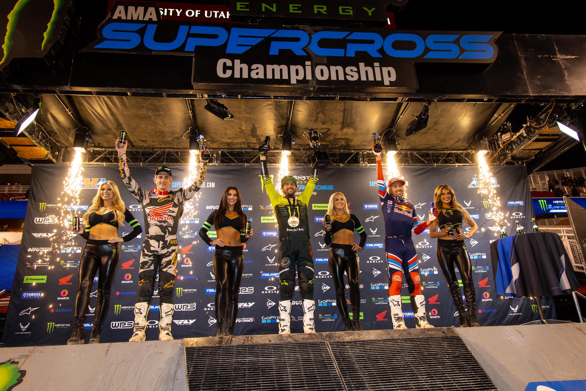 The 450SX main event podium: Jason Anderson (center, first), Chase Sexton (left, second), and Justin Barcia (right, third).