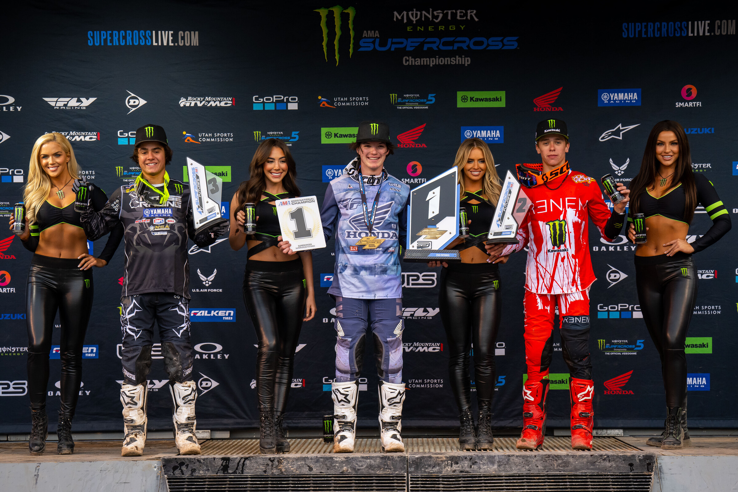 The 2022 250SX Futures finale main event podium finish: Chance Hymas (center, first), Ryder DiFrancesco (right, second), and Gavin Towers (left, third).