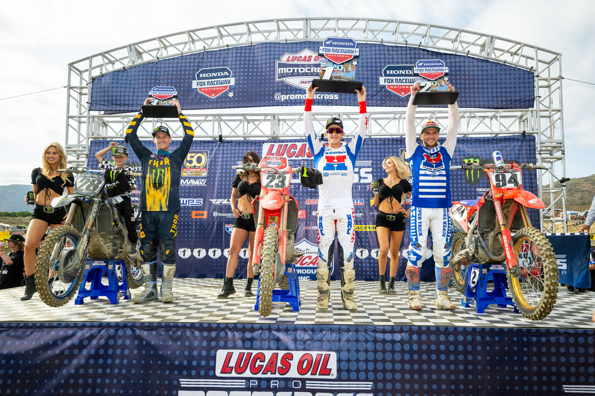 The 250 Class overall podium: Chase Sexton (center, fist overall), Ken Roczen (right, second overall), and Christian Craig (left, third overall).