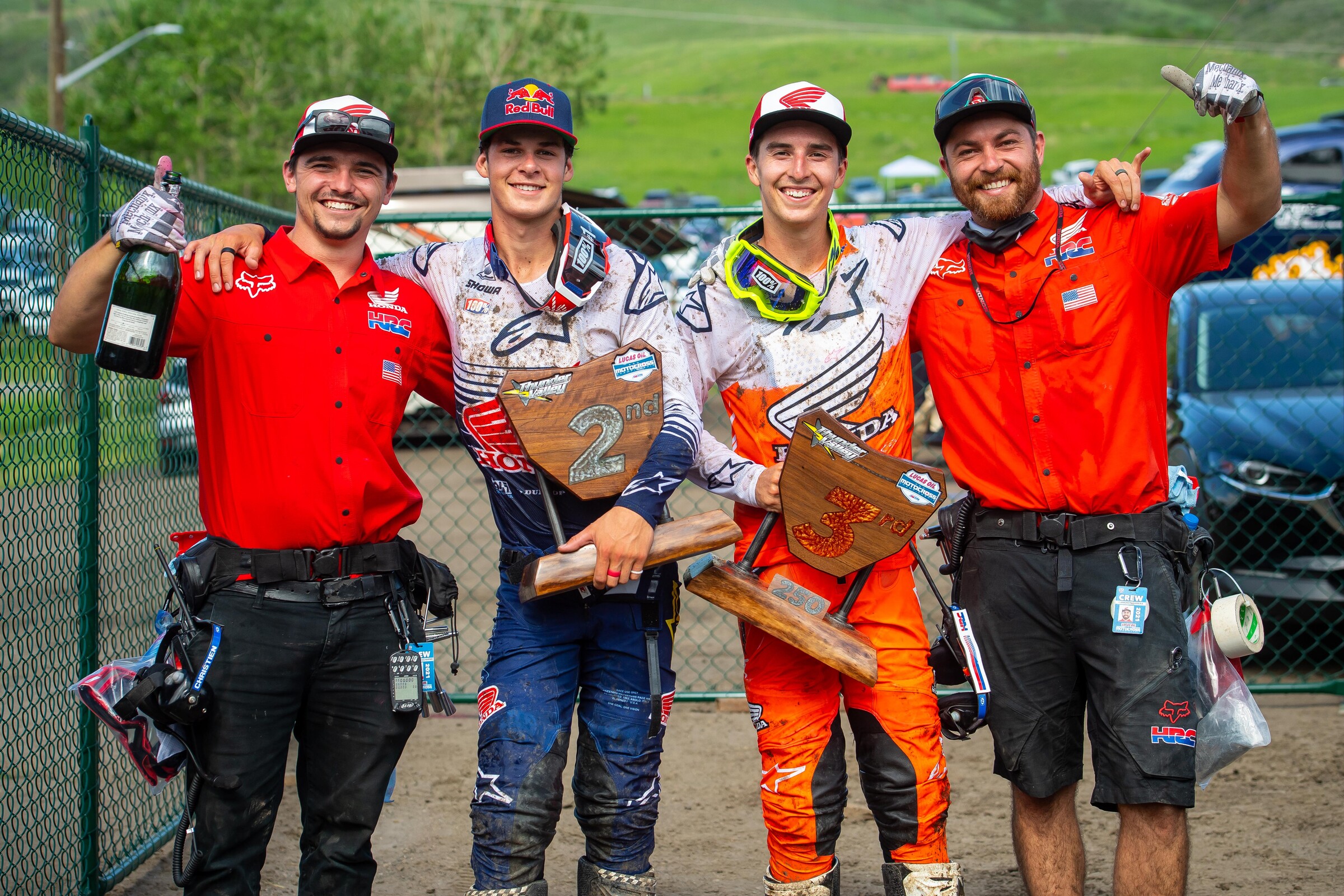 The Lawrence brothers and their mechanics at the 2021 Thunder Valley National, their first Pro Motocross overall podium together.