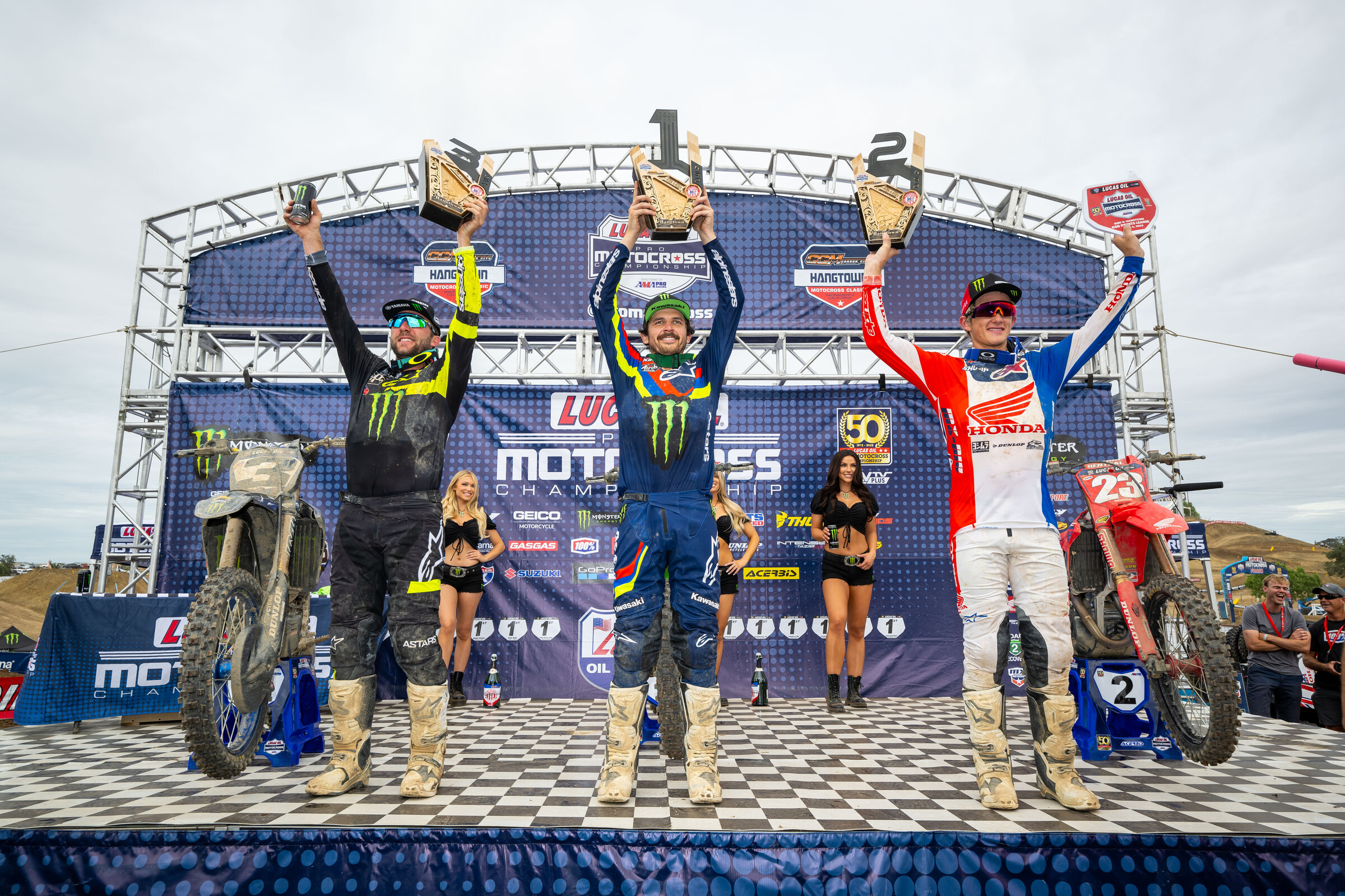 The 250 Class overall podium: Jason Anderson, (center, fist overall), Chase Sexton (right, second overall), and Eli Tomac (left, third overall).