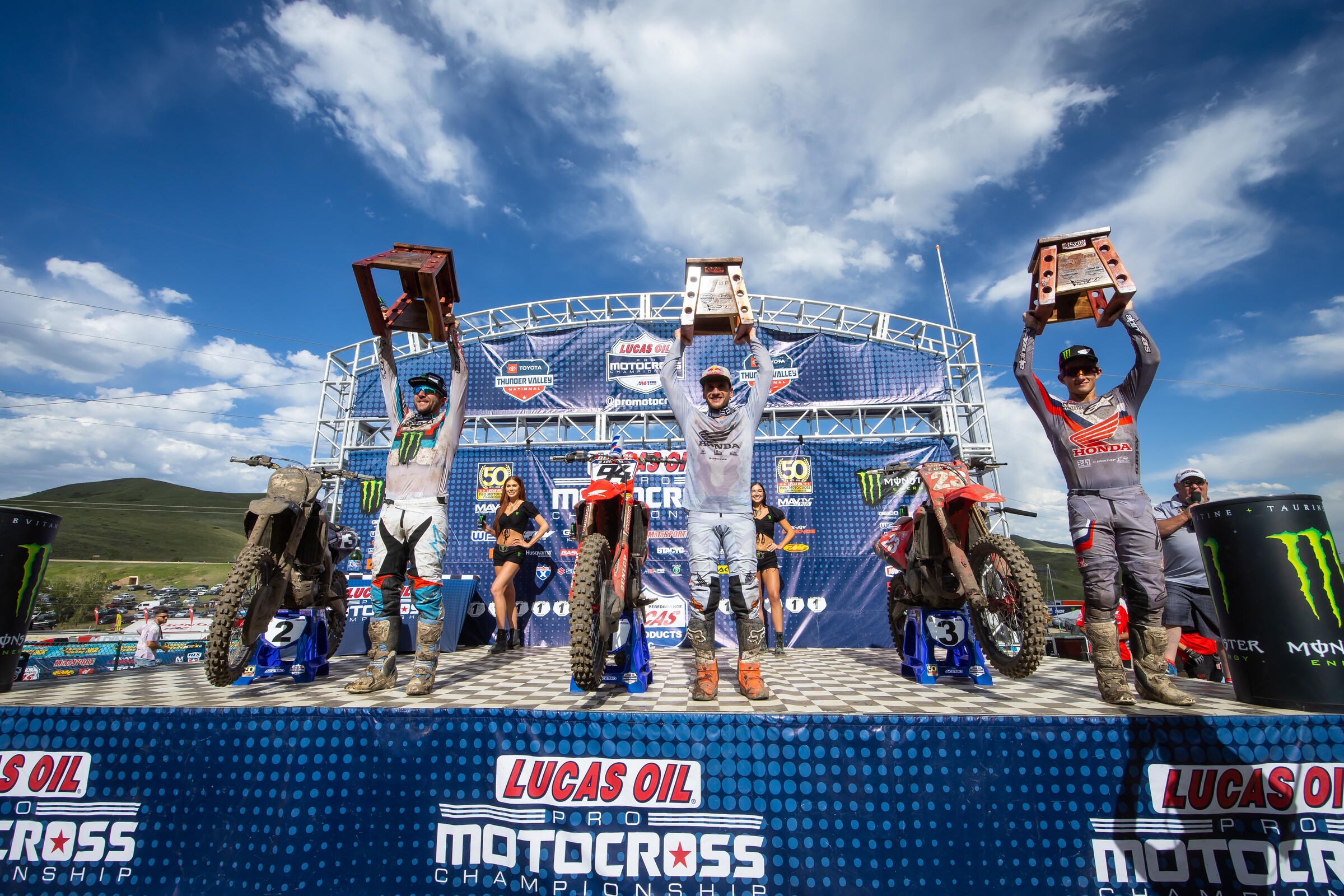 The 250 Class overall podium: Ken Roczen, (center, fist overall), Chase Sexton (right, third overall), and Eli Tomac (left, second overall).