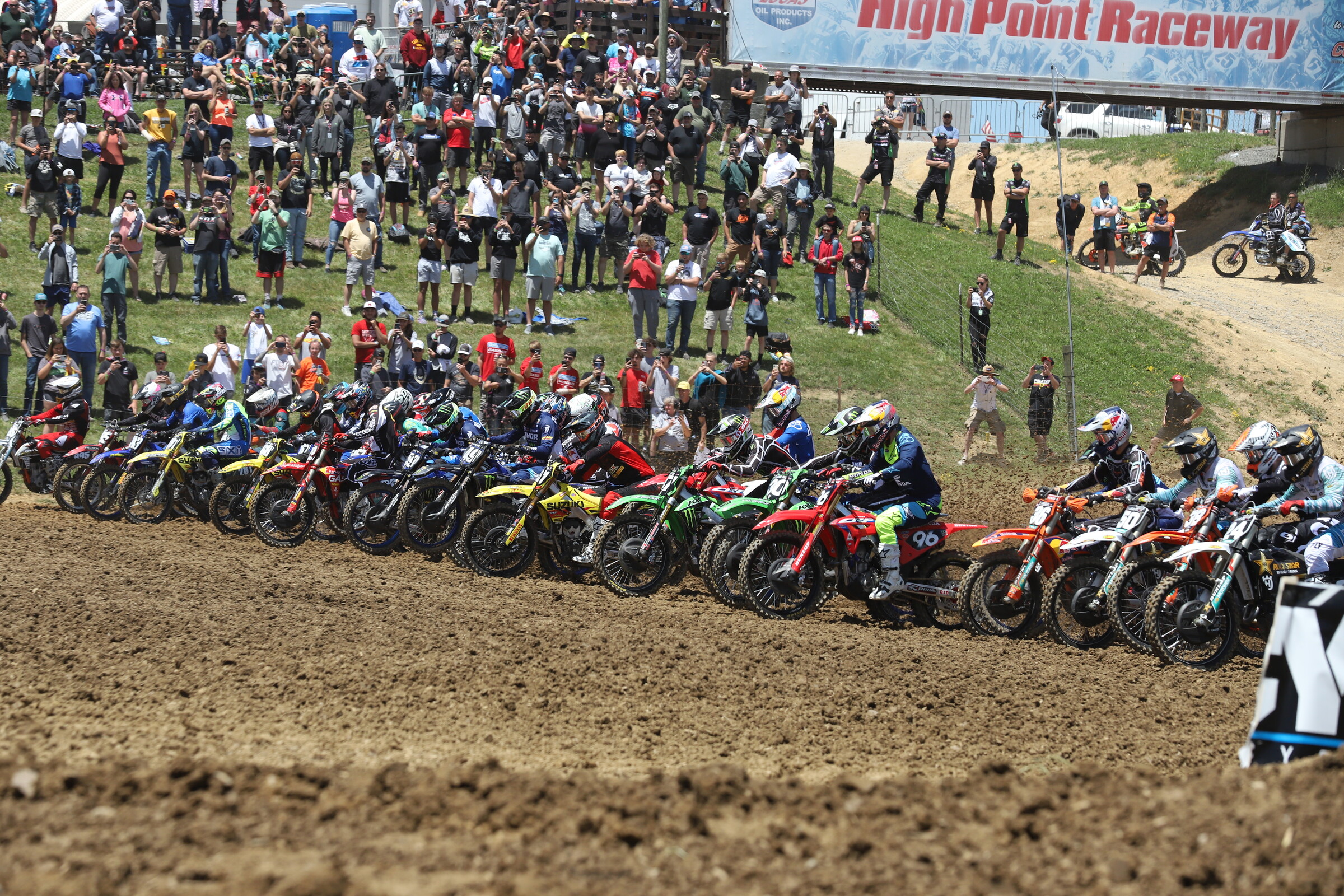 Riders blast out of the gates.