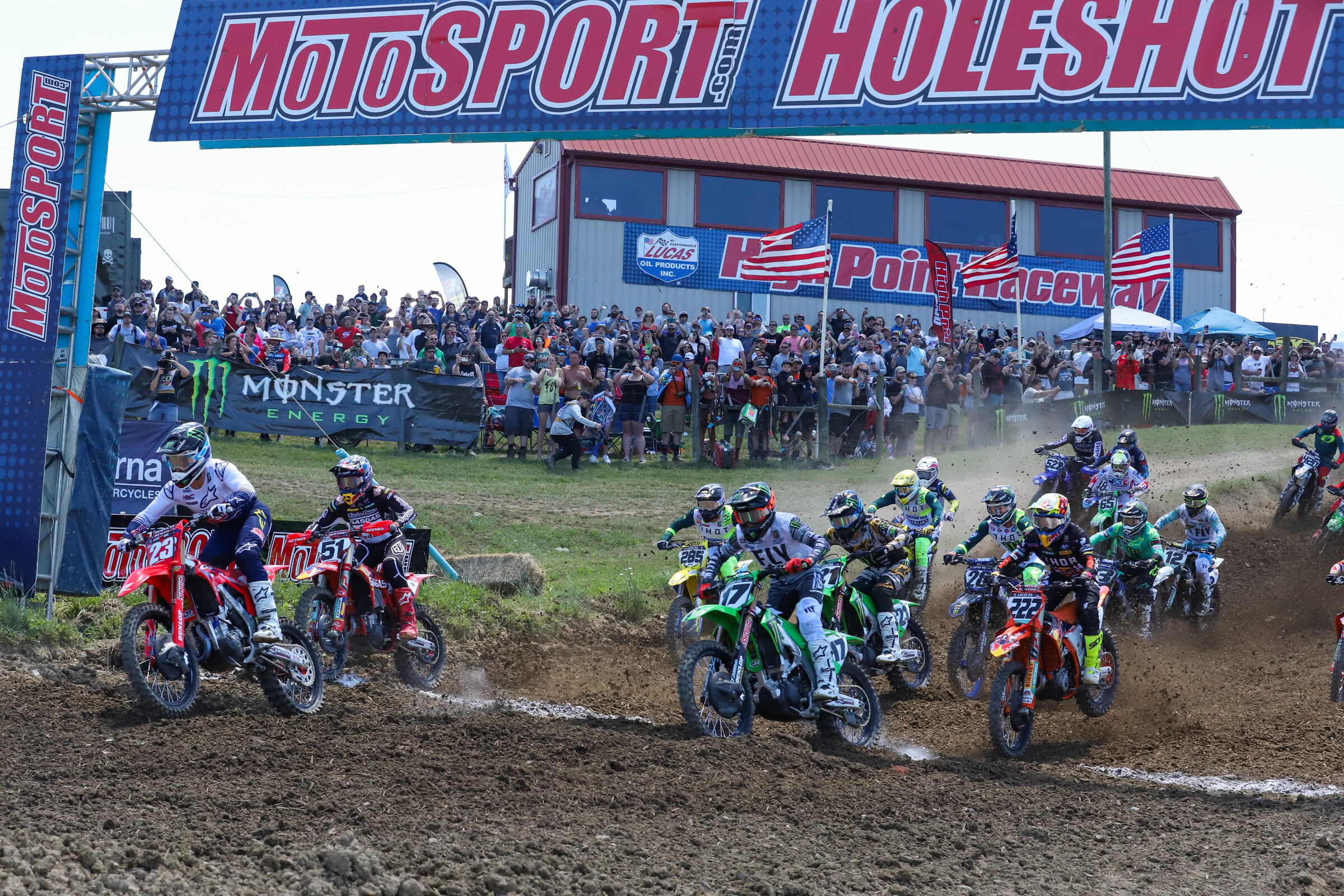 Chase Sexton with the holeshot ahead of Justin Barcia and Joey Savatgy.