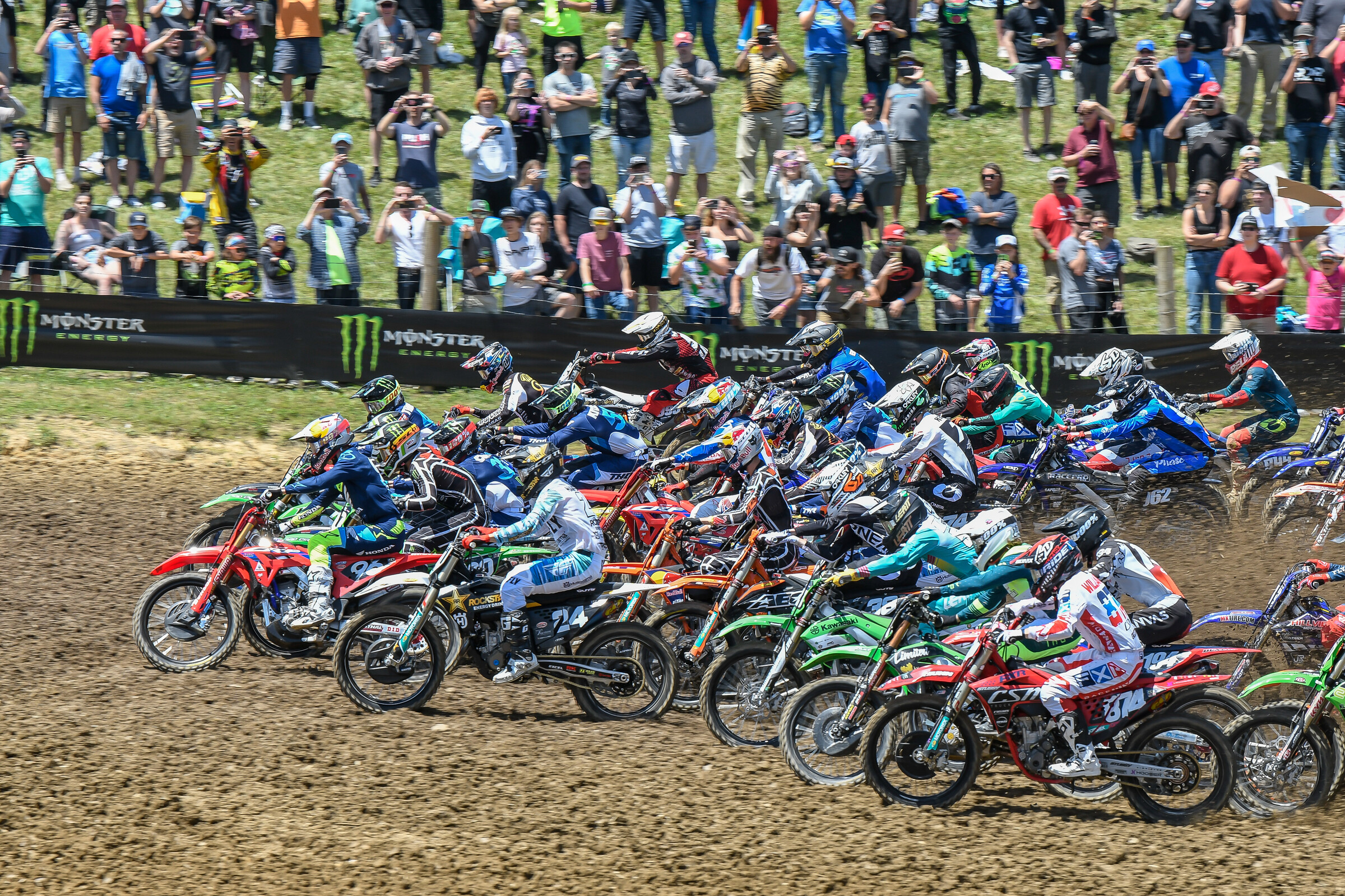 Zack Williams (#874 bottom right) in a drag race with 39 others into the first turn at High Point