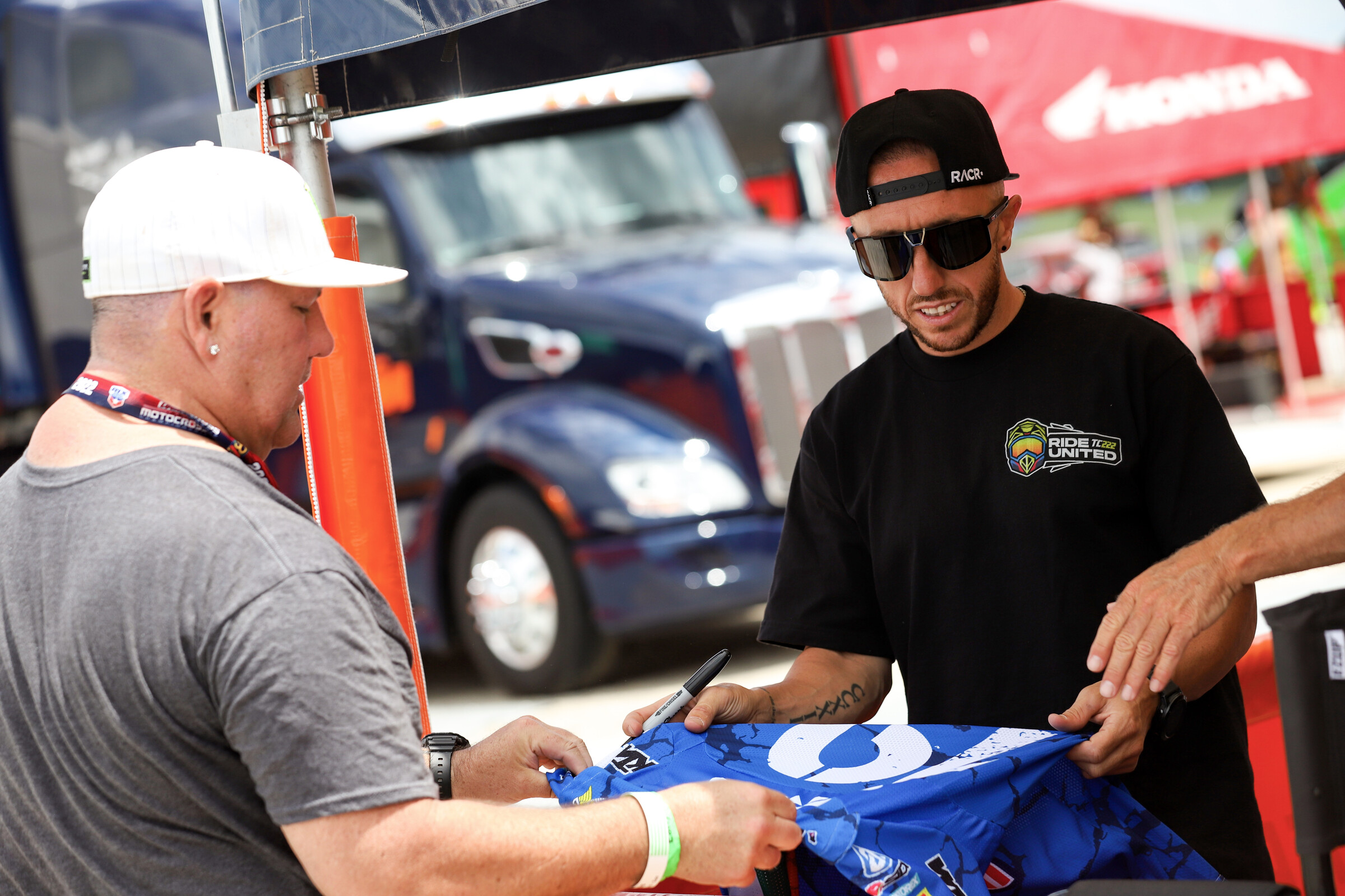 Cairoli about to sign an old jersey for a fan ahead of the High Point National.