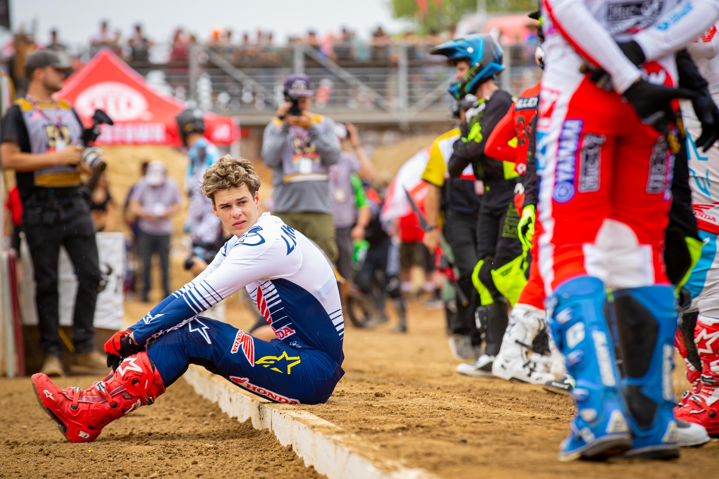 Jett doing a little pre-moto,  behind-the-gate stretching.