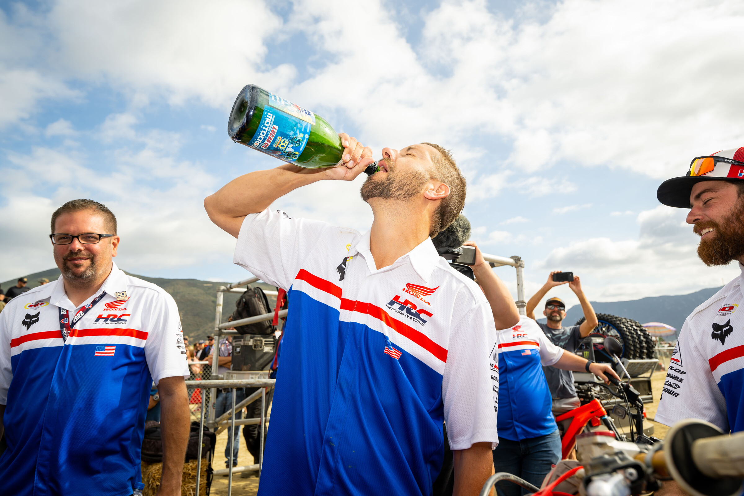Lindstorm tasting the podium champagne at the Pro Motocross opener, when Honda HRC went first and second in all four motos.