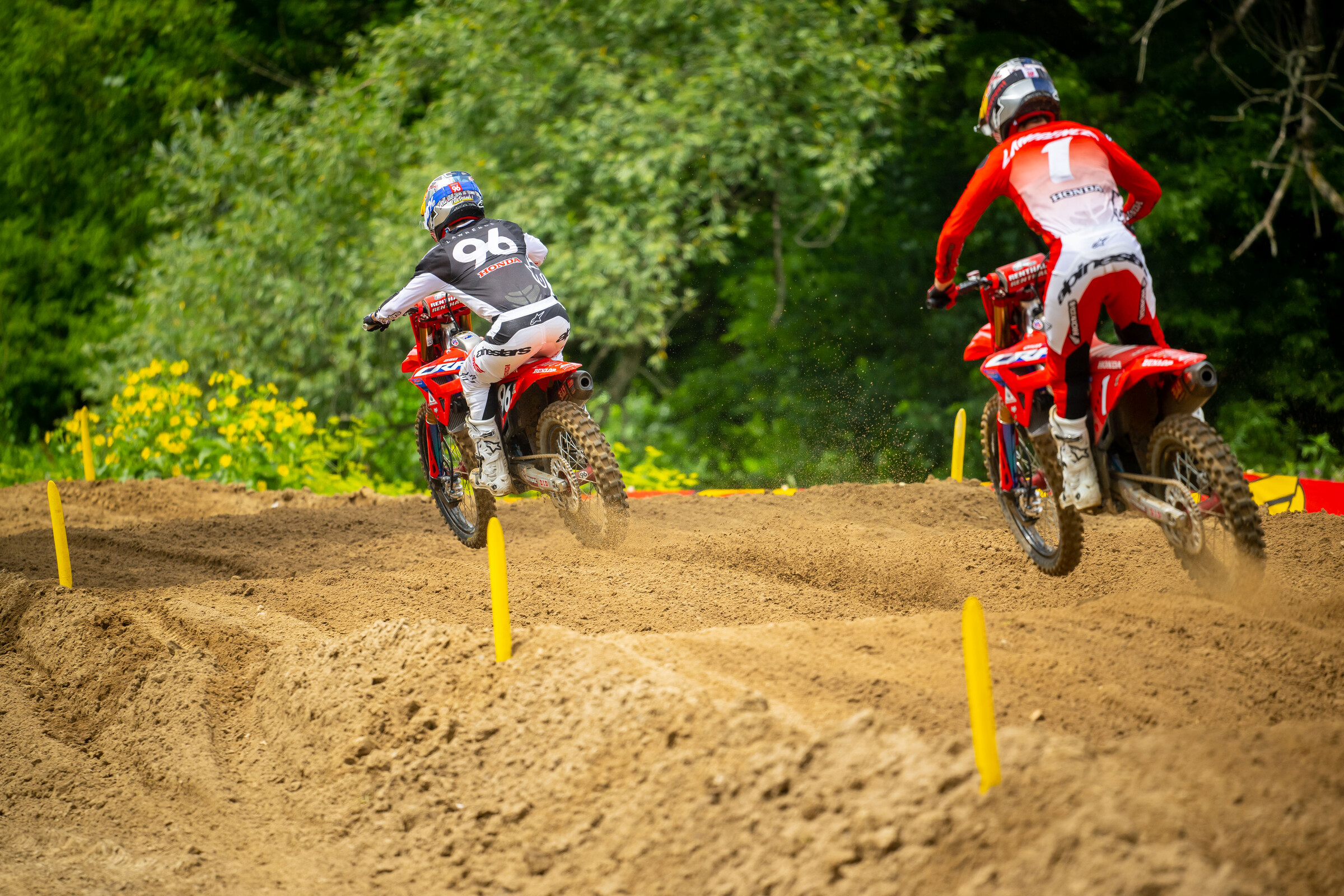 Hunter Lawrence leads his brother Jett through the sand whoops.