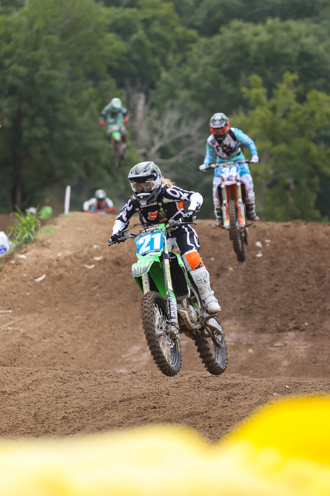 Kyleigh Stallings leading Taylor Allred and Sophia Pehlps.