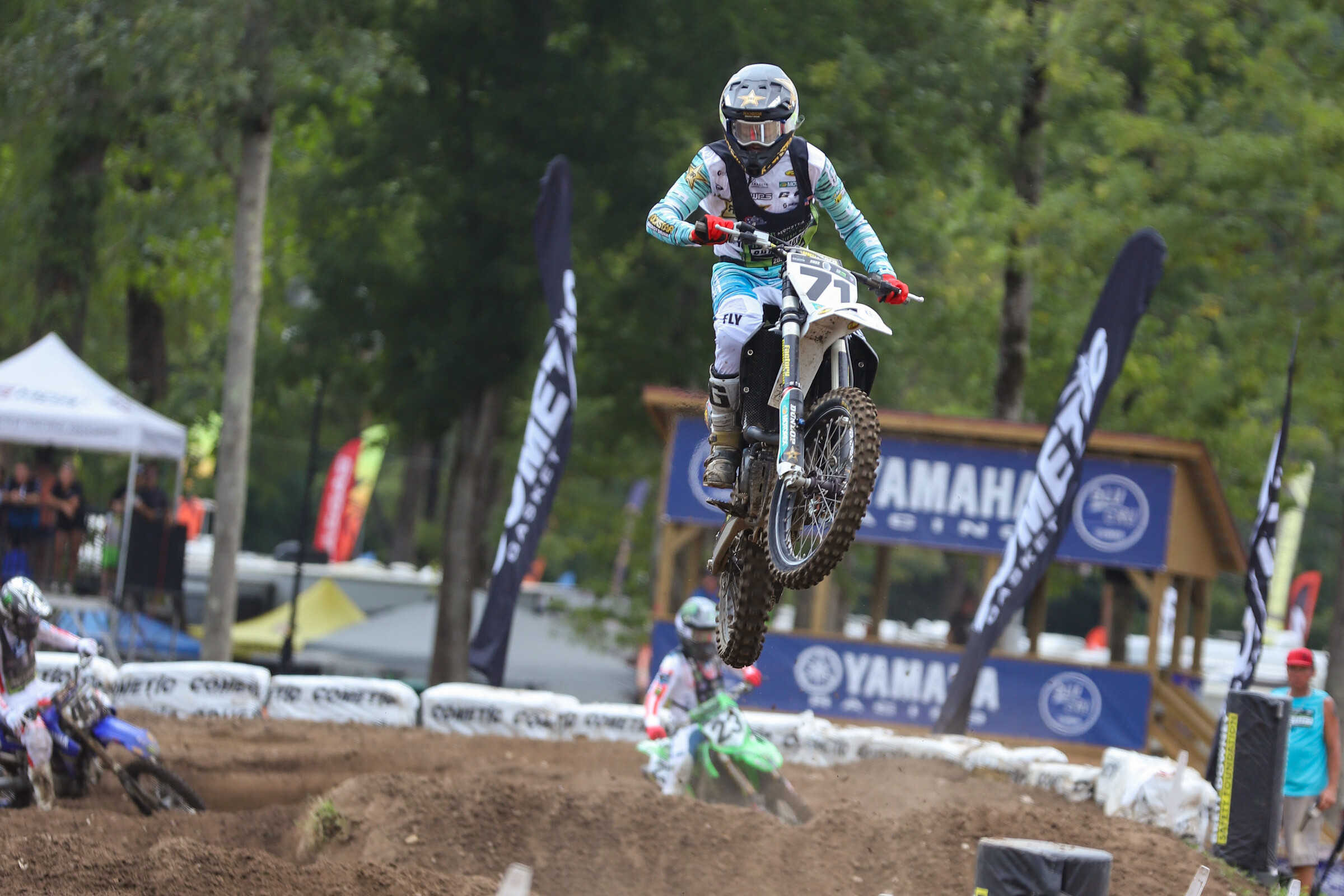 Talon Hawkins with Jayden Clough and Ryder DiFrancesco running second and third.