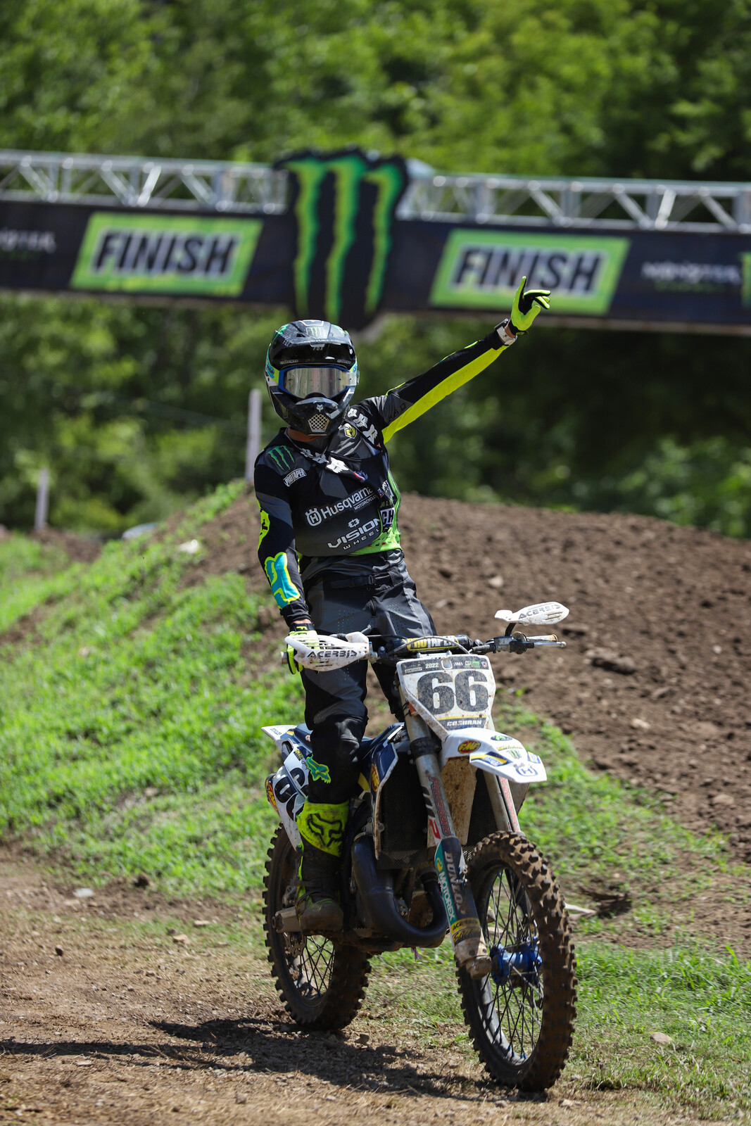 Casey Cochran celebrates a moto win (and title) in the Schoolboy 1 (12-17) B-C class on Saturday.