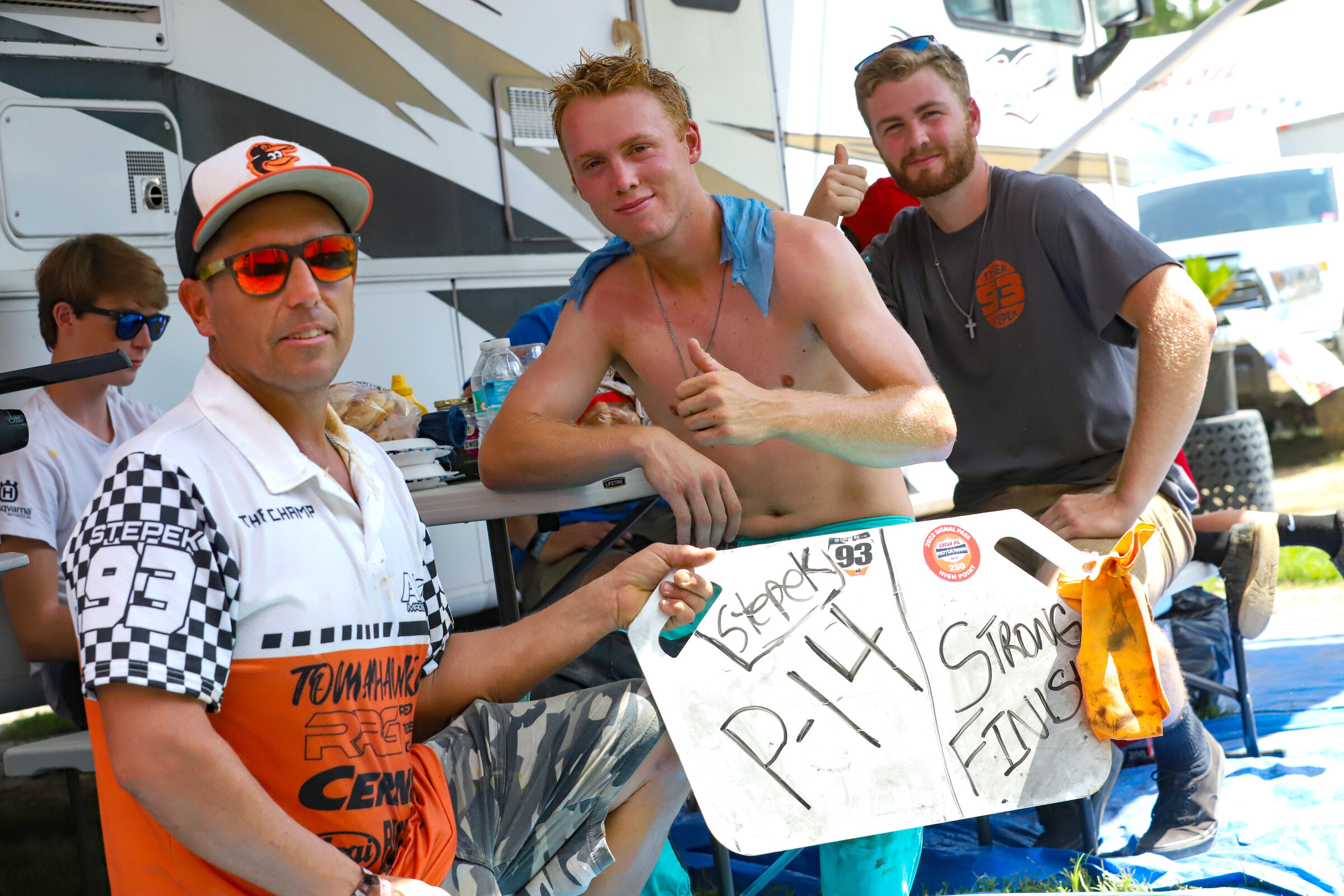 Stepek with his crew after the first moto.