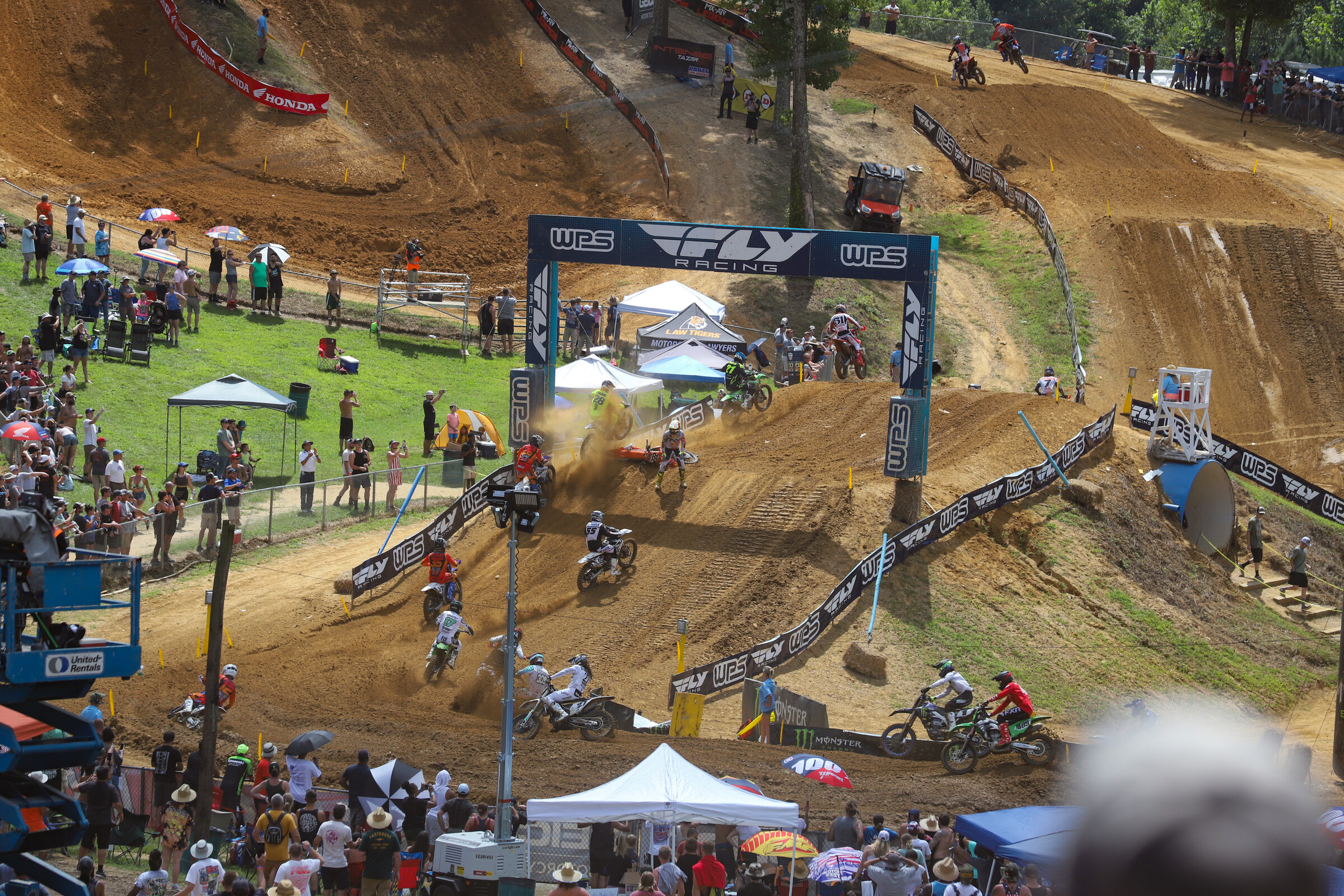 Antonio Cairoli trying to avoid getting hit after going down on the face of a jump.