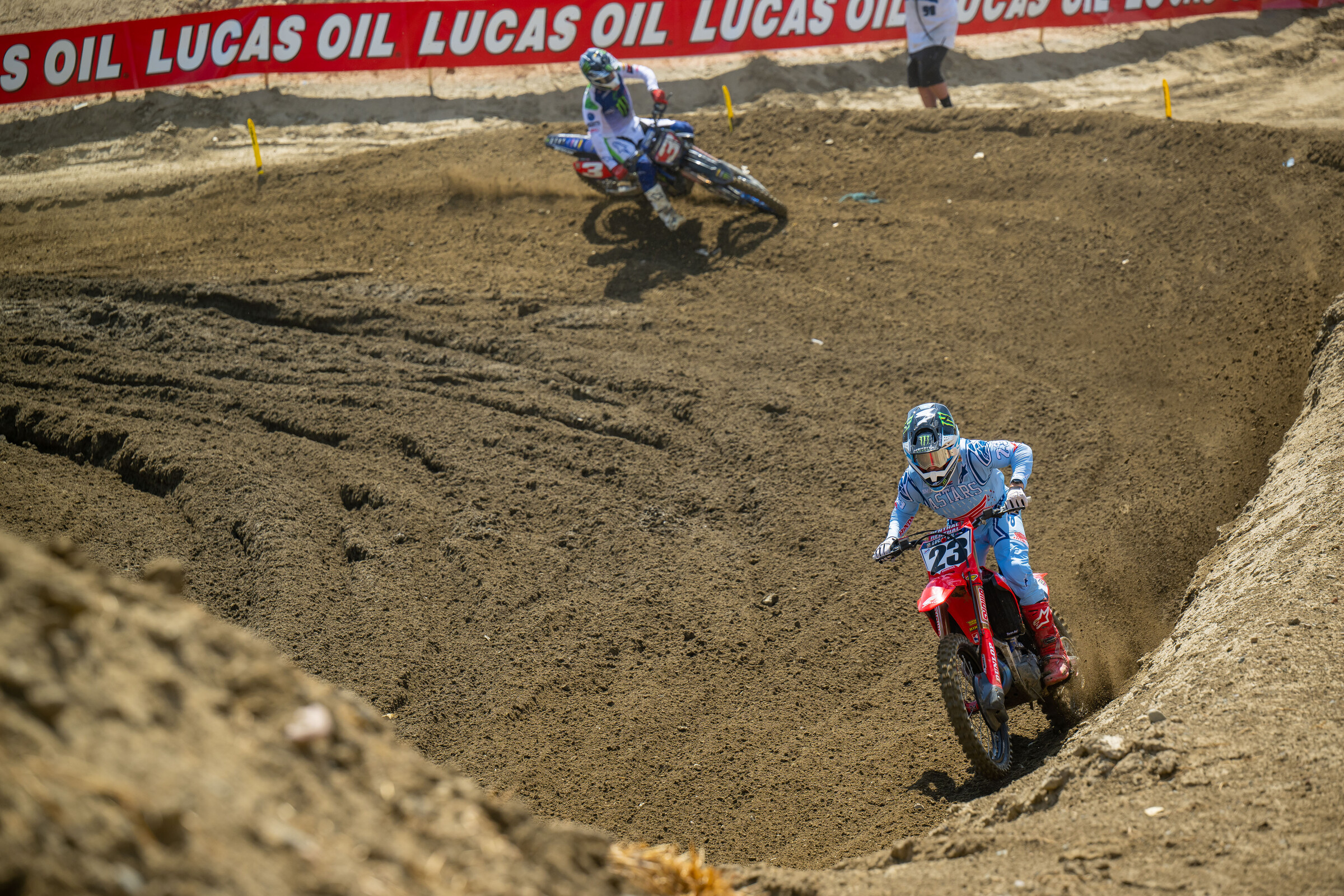 Chase Sexton leading Eli Tomac in the first moto.