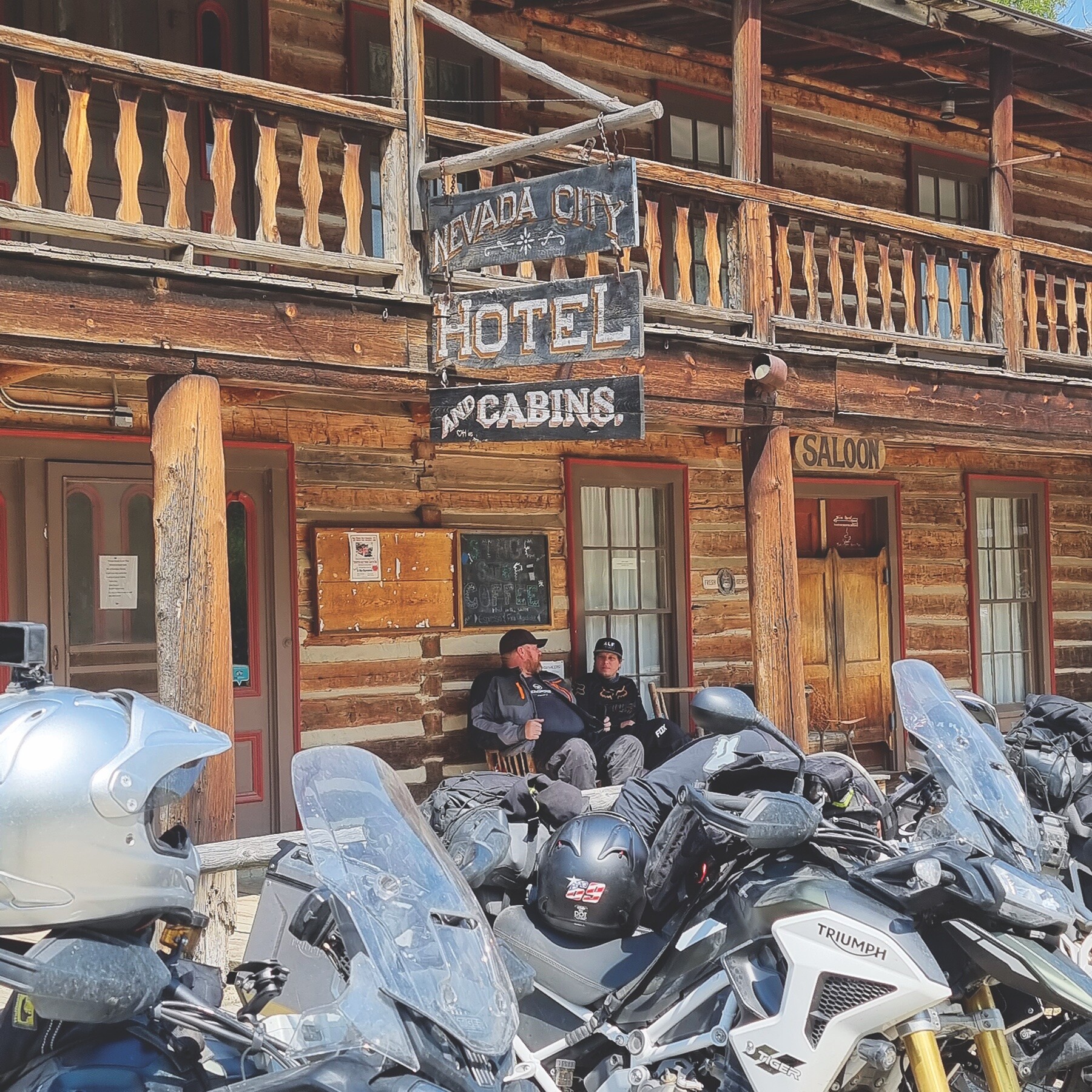 Ray Butts and Chad Warrix take a break in Nevada City, Montana