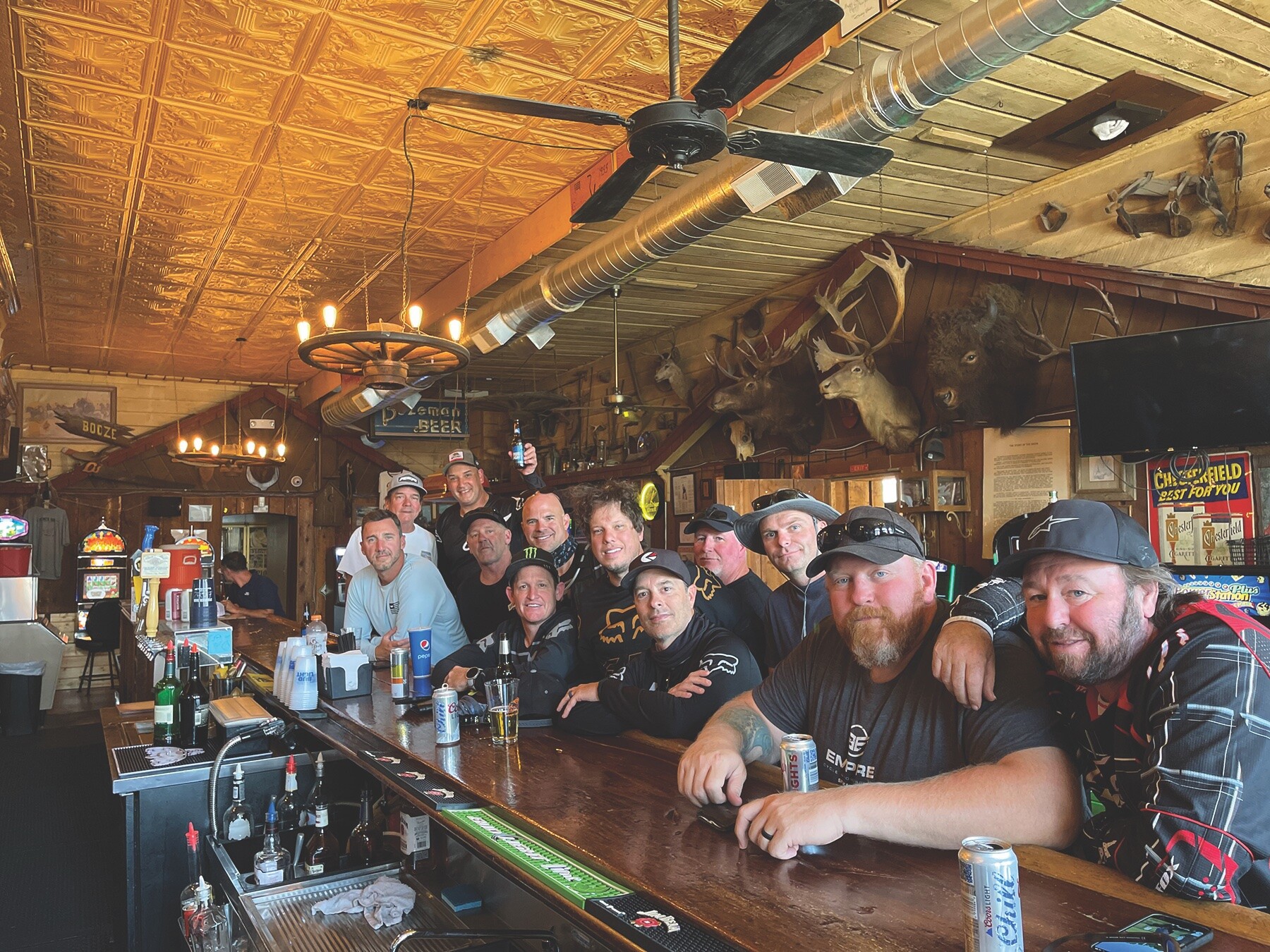 Group photo at Skalkaho Falls; a pair of Triumph Tiger 1200 Rally Pros