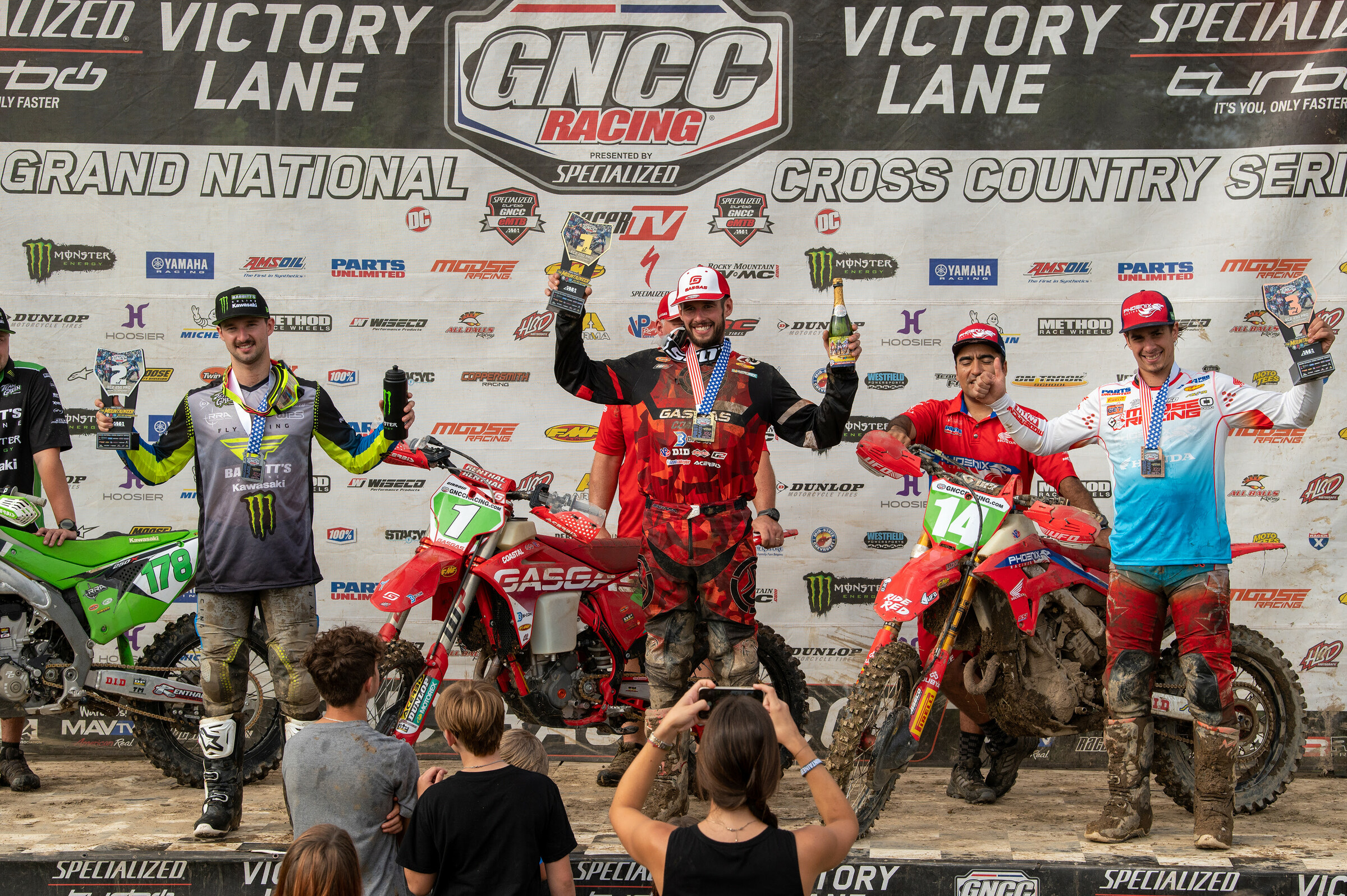 Johnny Girroir (center), Lyndon Snodgrass (left) and Ruy Barbosa (right) rounded out the XC2 250 Pro class top three.