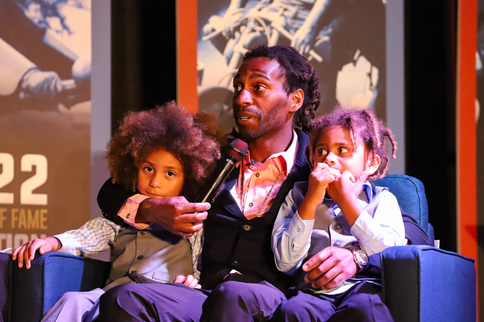 JS7 being interviewed his two boys by his side.