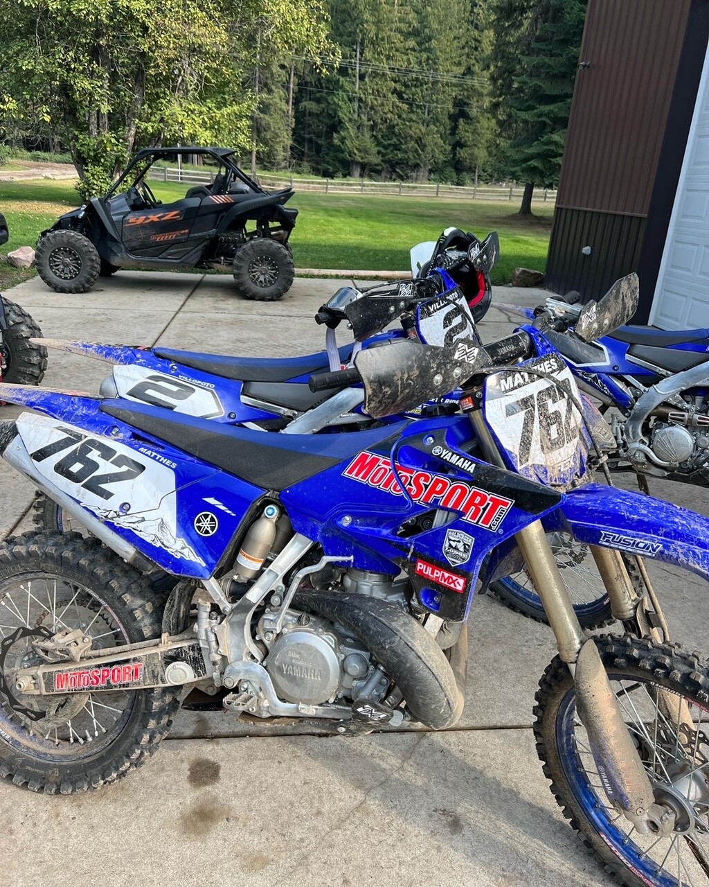 Matthes' two-stroke ride next to Villopoto's YZ250FX four-stroke.