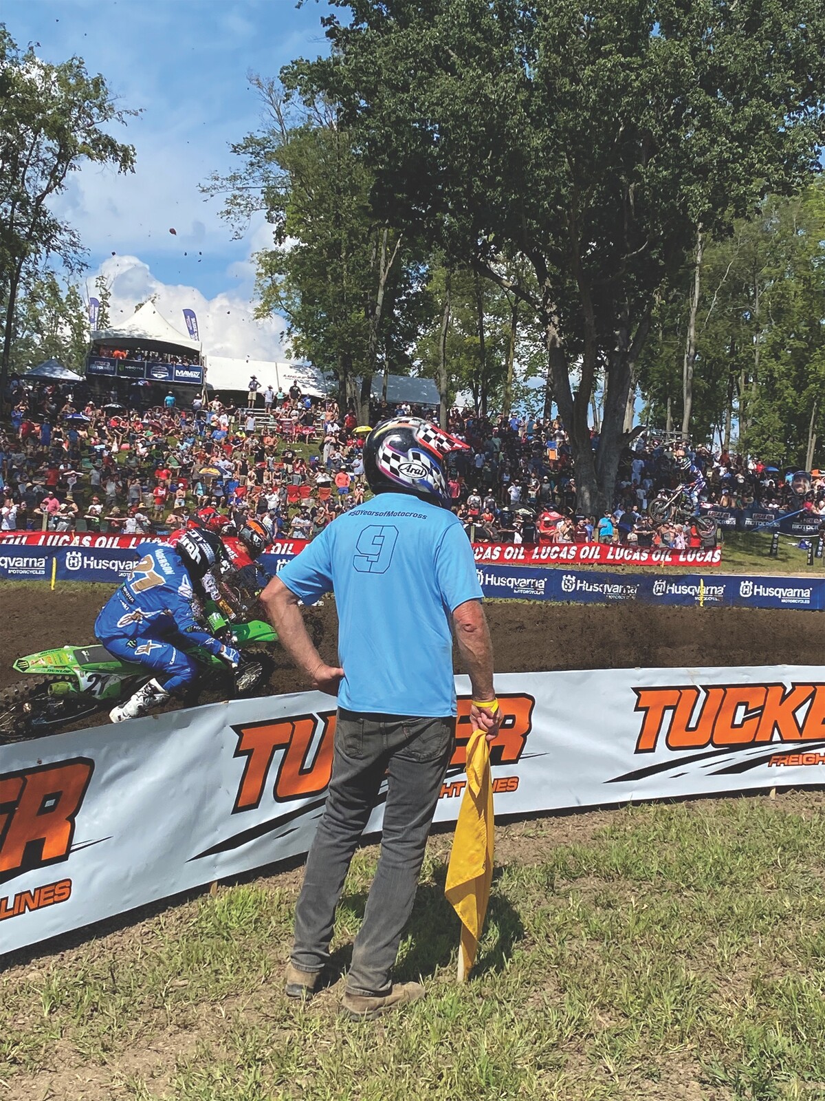 Excellent caution flagger form, looking down the track at Ironman.