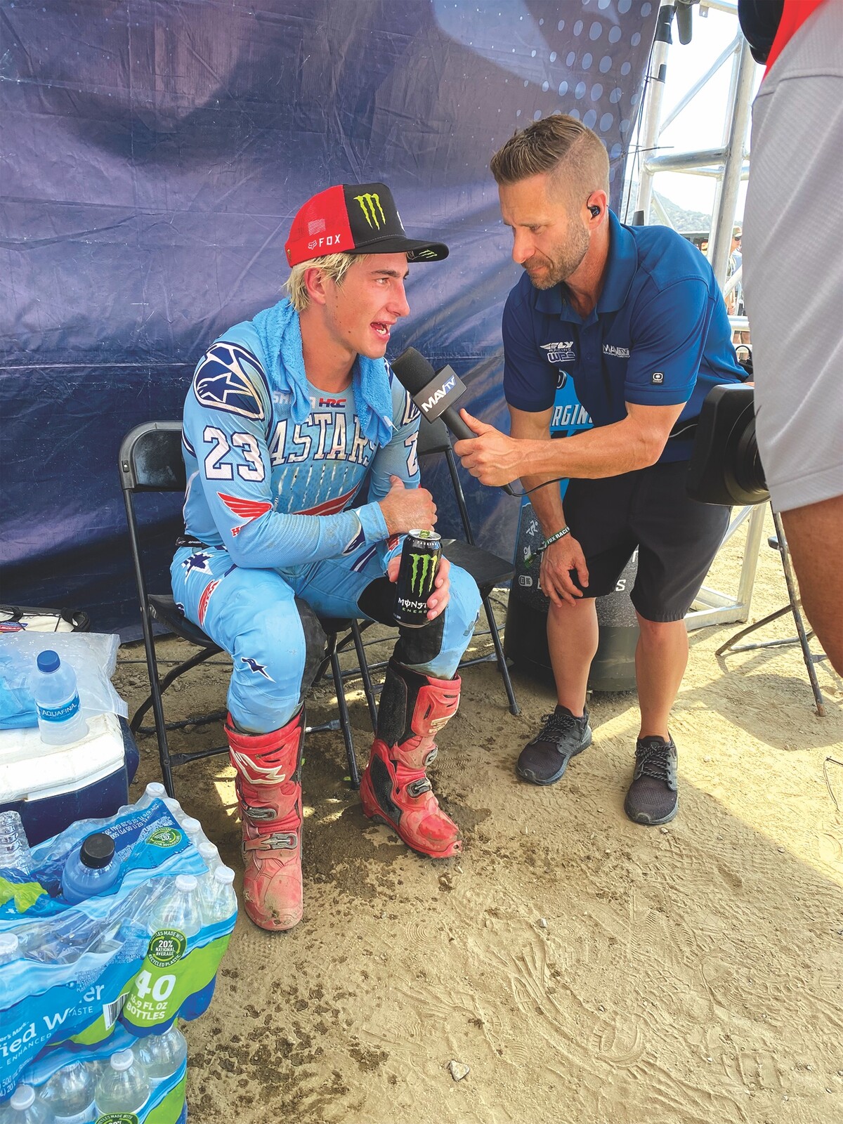 Jason Thomas lets Chase Sexton stay seated after the hot one at Fox Raceway.
